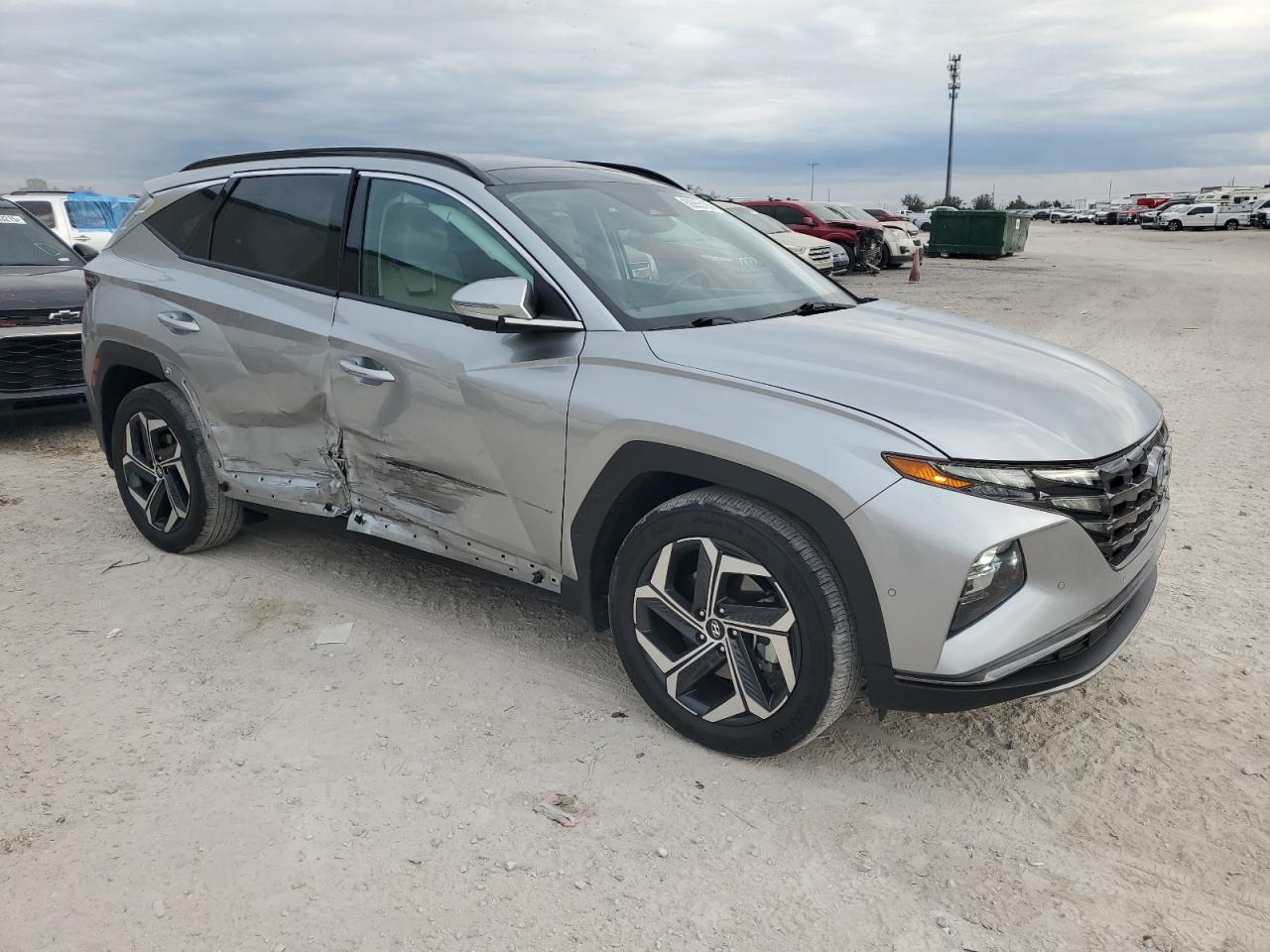2022 Hyundai Tucson VIN 5NMJE3AE4NH108467 Copart auction photo, side damage thumbnail 4