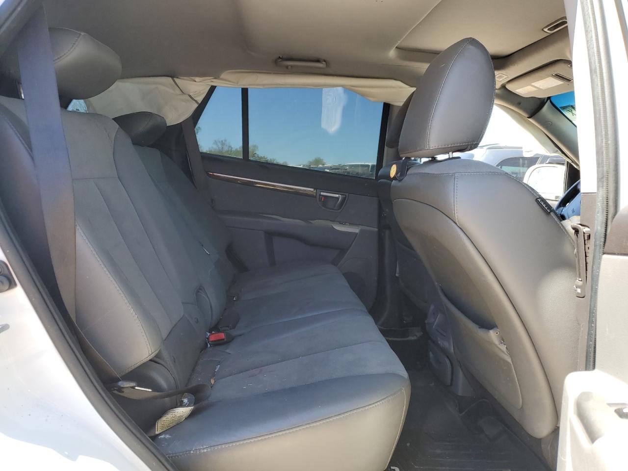 2012 Hyundai Santa Fe VIN 5XYZHDAG8CG129427 Copart auction photo, rear end / minor dent/scratches damage thumbnail 10