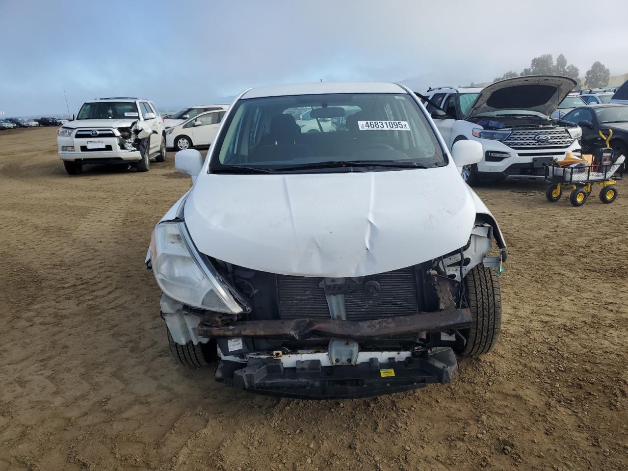 2010 Nissan Versa VIN 3N1BC1CP9AL370126 Copart auction photo, front end / side damage thumbnail 5