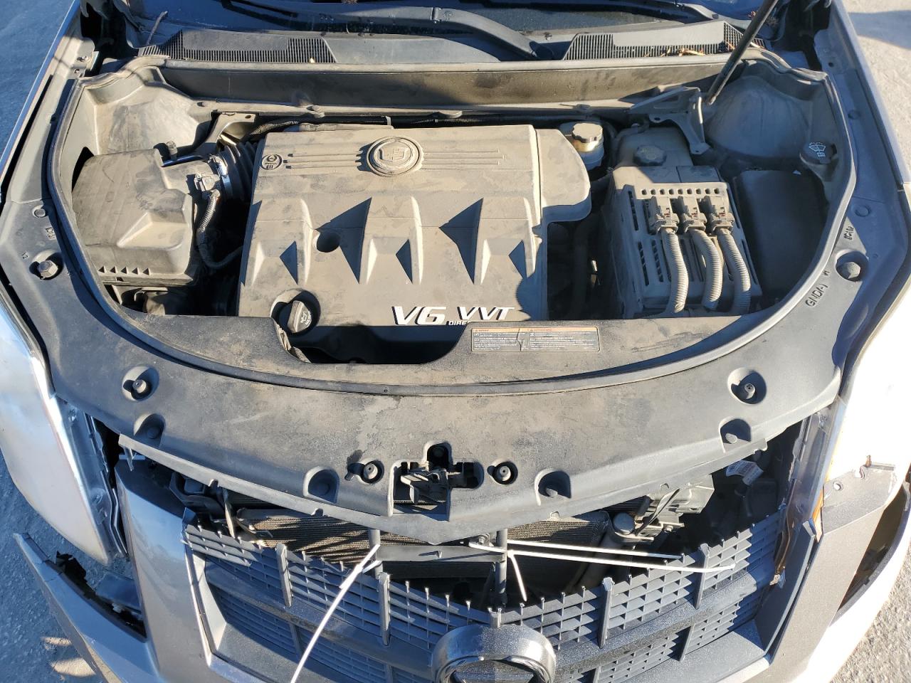 2012 Cadillac SRX VIN 3GYFNAE37CS541302 Copart auction photo, all over damage thumbnail 12