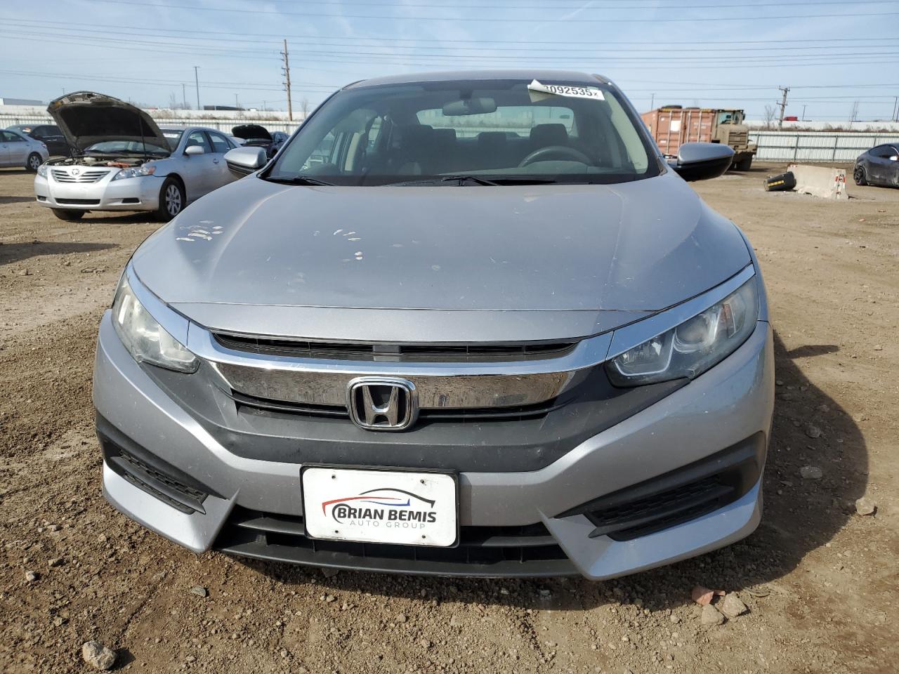 2016 Honda Civic VIN 19XFC2F58GE049321 Copart auction photo, front end / side damage thumbnail 5