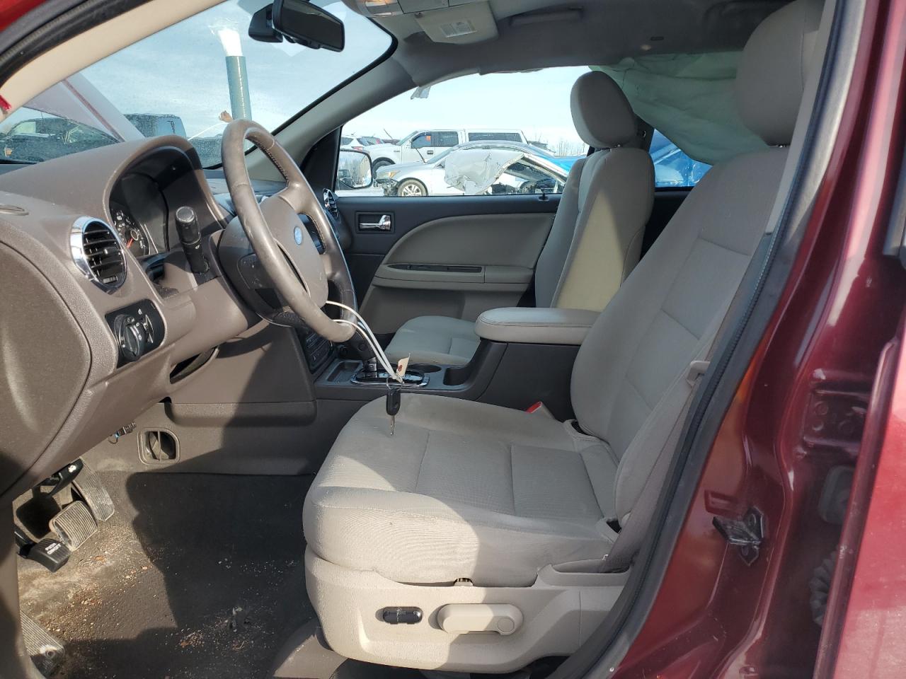 2008 Ford Taurus VIN 1FMDK05W58GA37911 Copart auction photo, side / rear end damage thumbnail 7