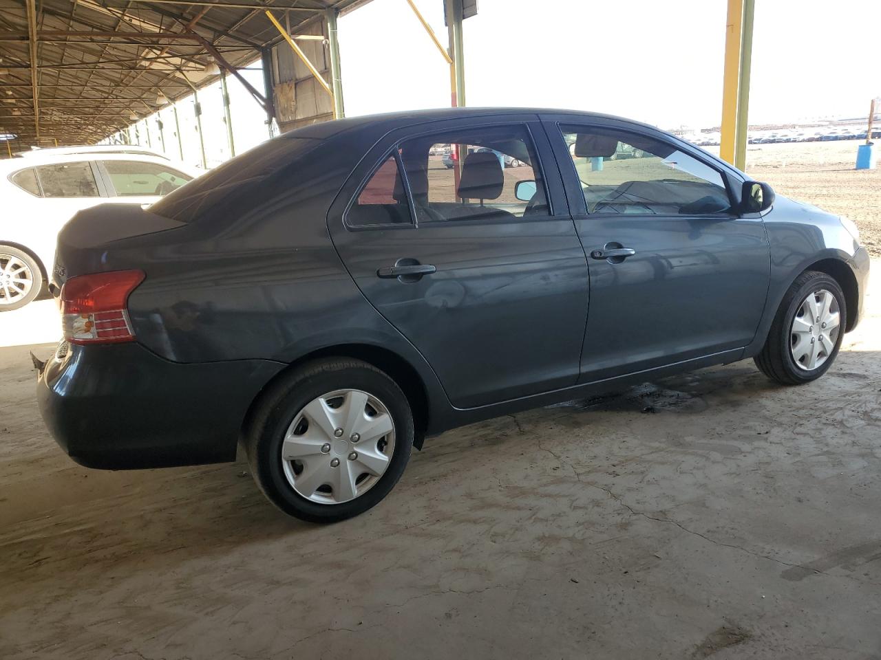 2007 Toyota Yaris VIN JTDBT923771012985 Copart auction photo, rear end damage thumbnail 3