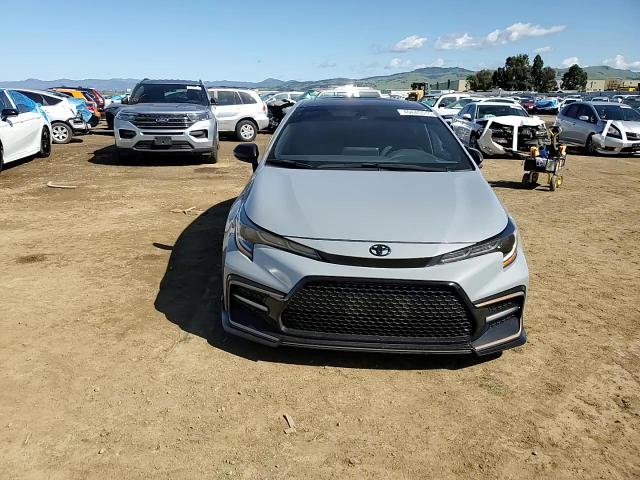 2022 Toyota Corolla VIN 5YFT4MCE7NP112484 Copart auction photo, vandalism damage thumbnail 11