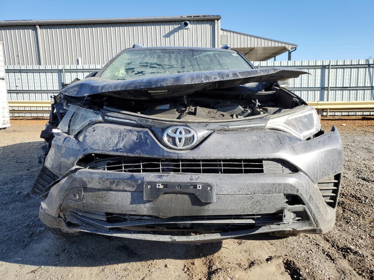 2016 Toyota RAV 4 VIN JTMBFREV2GJ087503 Copart auction photo, front end / side damage thumbnail 5