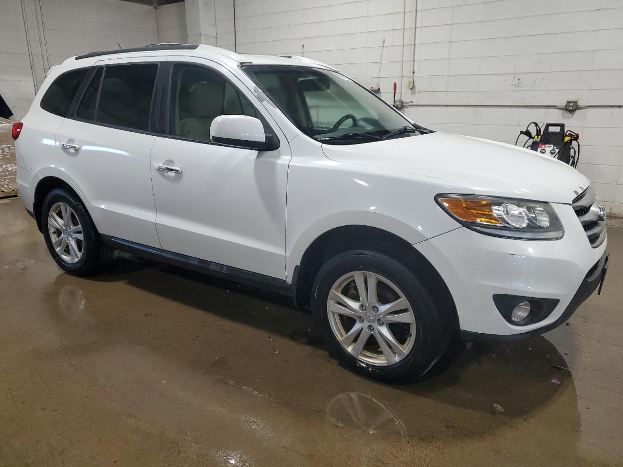 2012 Hyundai Santa Fe VIN 5XYZKDAG9CG155648 Copart auction photo, front end damage thumbnail 4