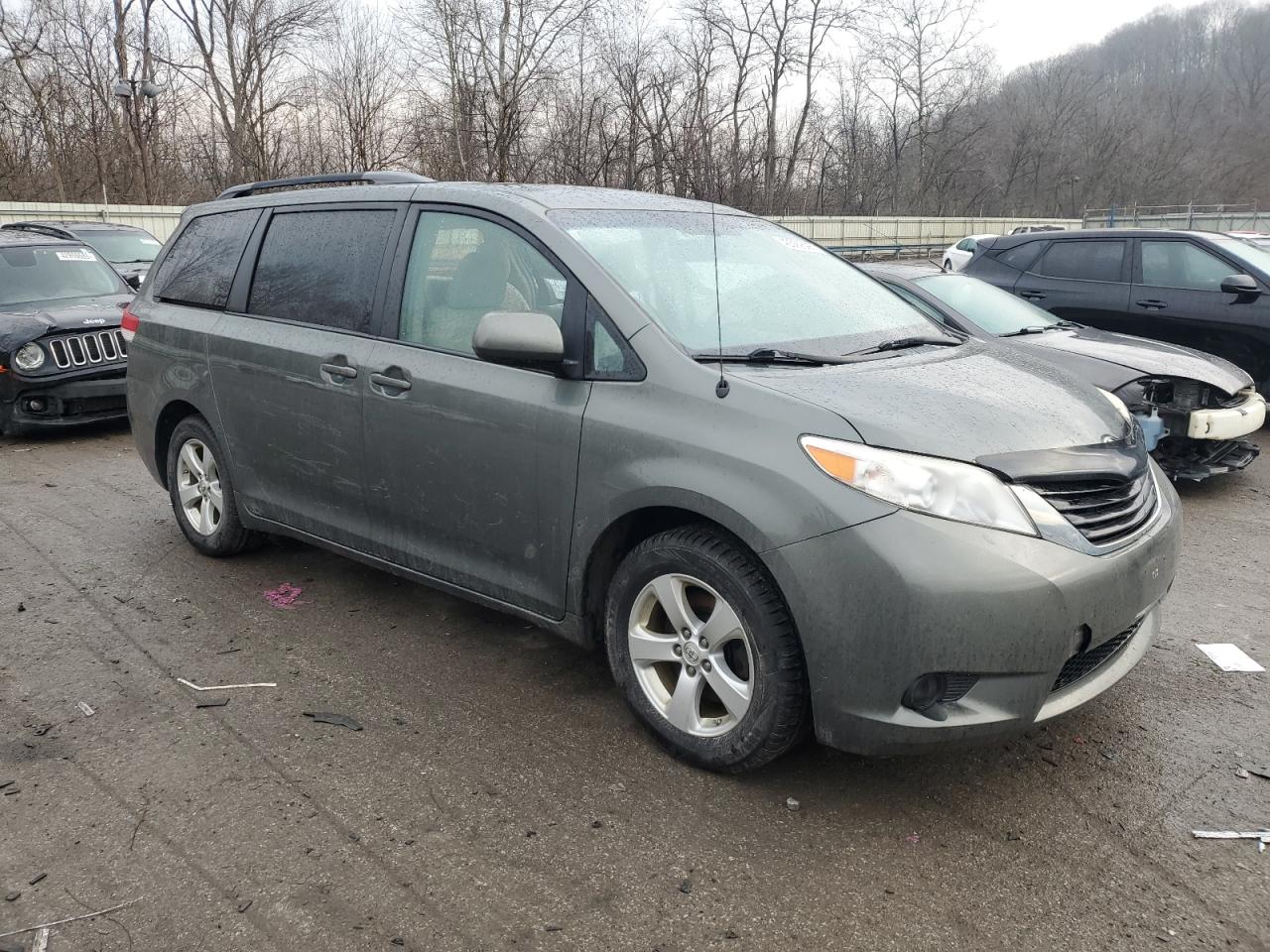 2014 Toyota Sienna VIN 5TDKK3DC3ES518035 Copart auction photo, side / rear end damage thumbnail 4