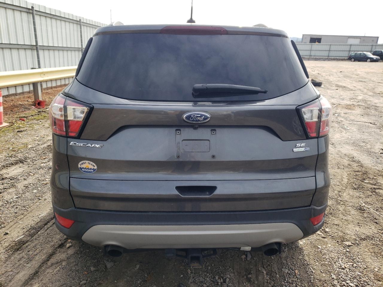 2018 Ford Escape VIN 1FMCU9GD2JUA80163 Copart auction photo, burn damage thumbnail 6