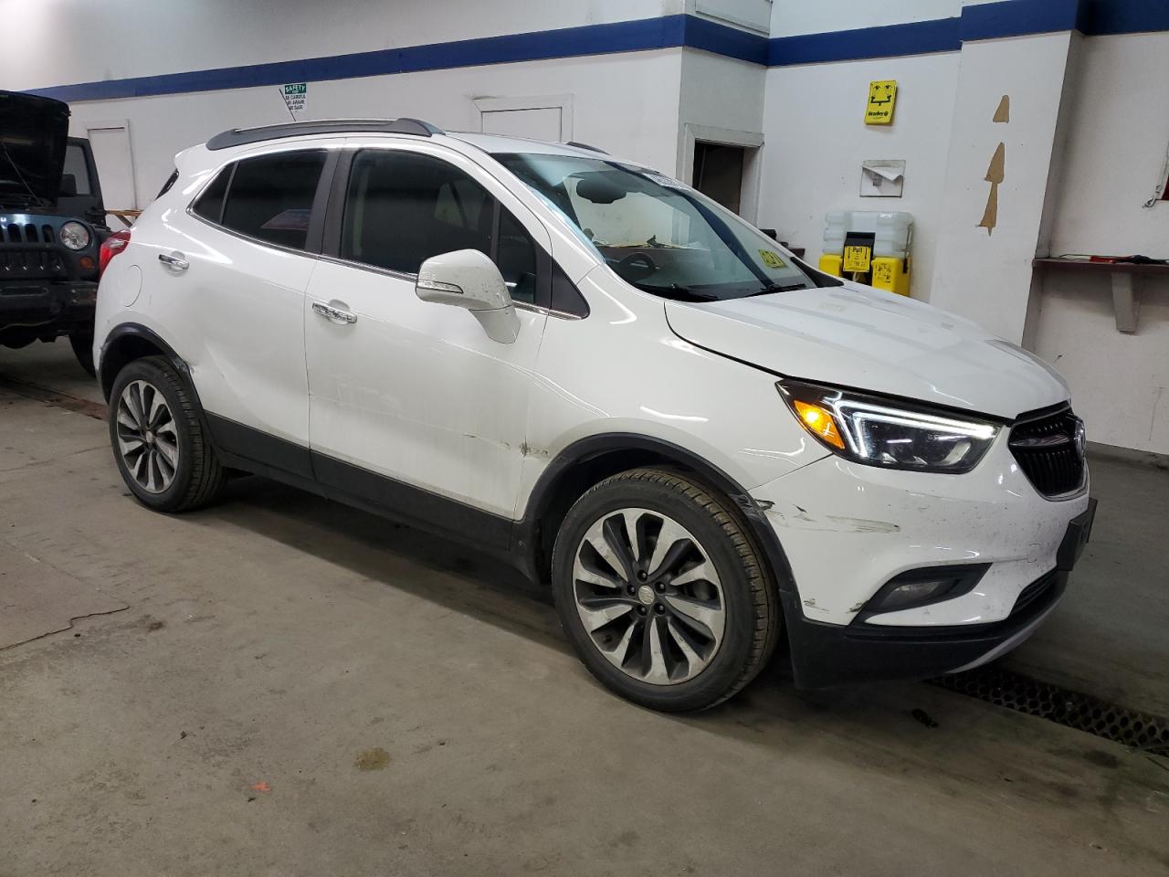 2018 Buick Encore VIN KL4CJGSB0JB524315 Copart auction photo, side / front end damage thumbnail 4