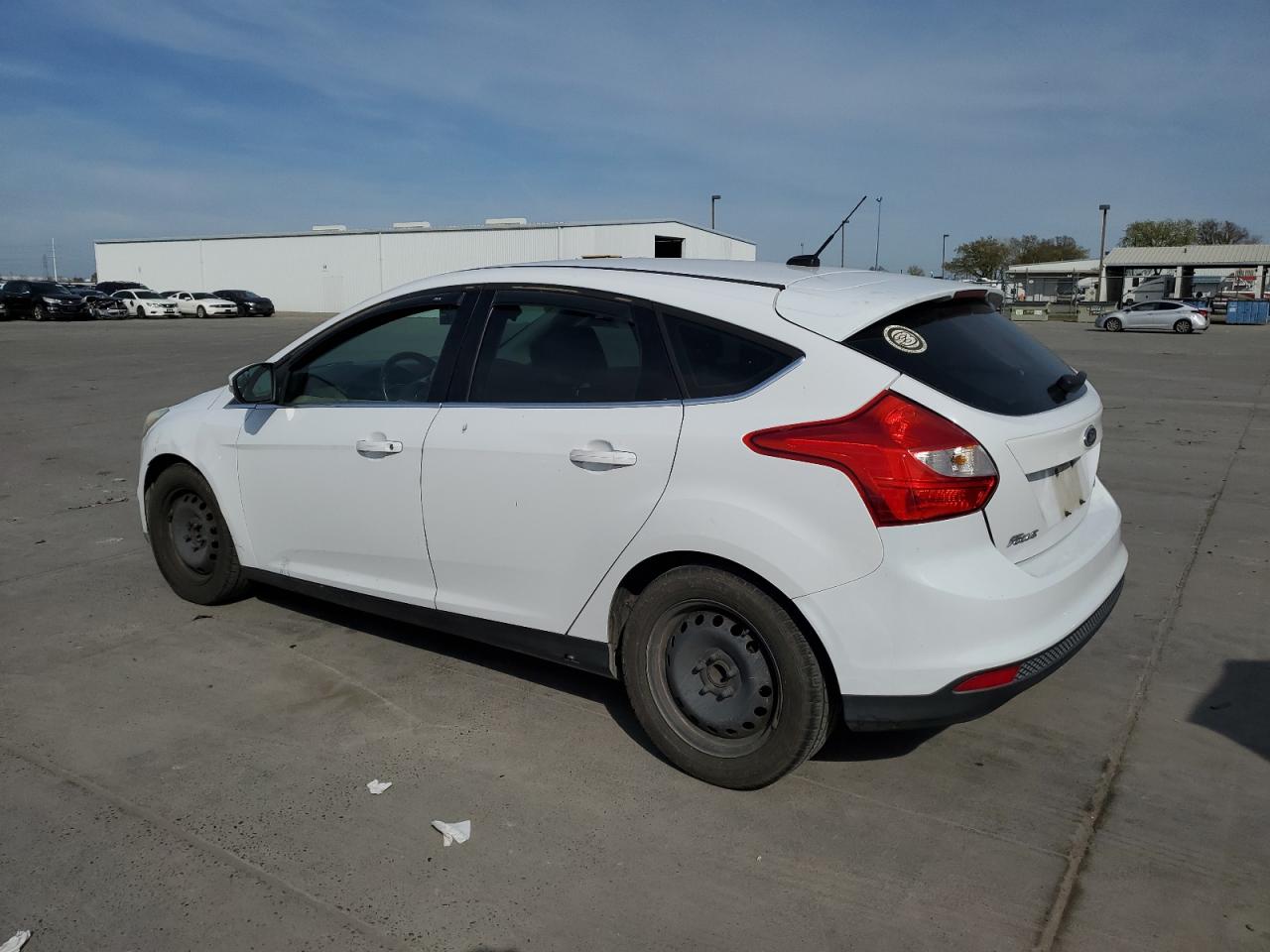 2012 Ford Focus VIN 1FAHP3M29CL200489 Copart auction photo, side damage thumbnail 2