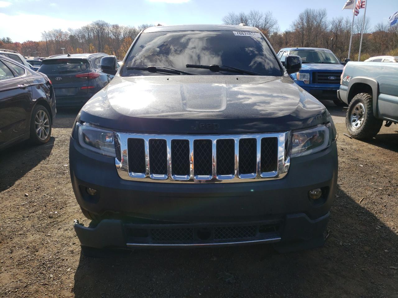 2012 Jeep Grand Cherokee VIN 1C4RJFCT8CC128468 Copart auction photo, front end / minor dent/scratches damage thumbnail 5