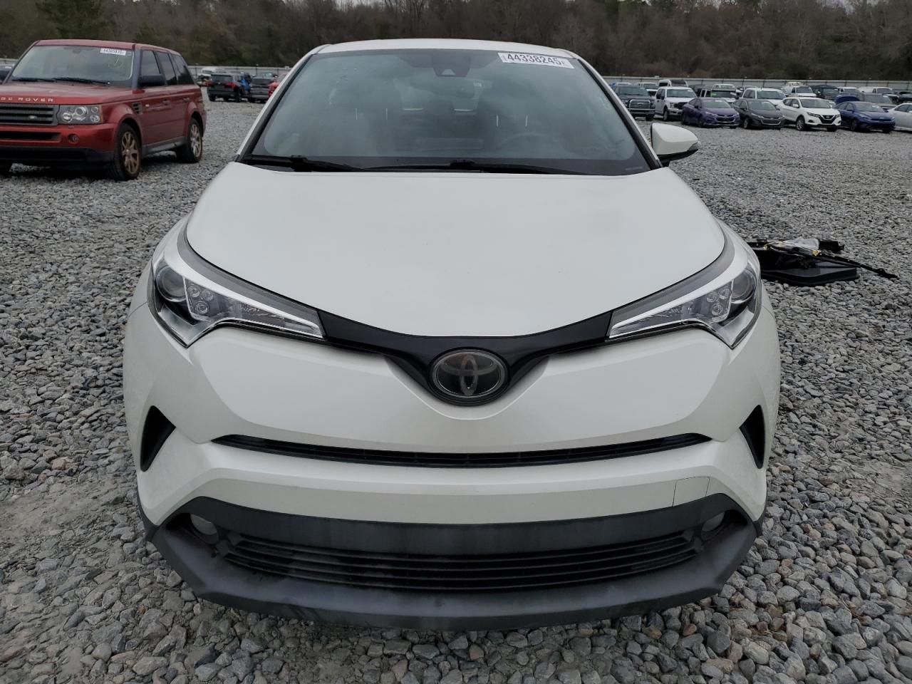 2018 Toyota C-HR VIN JTNKHMBX2J1004027 Copart auction photo, side / rear end damage thumbnail 5
