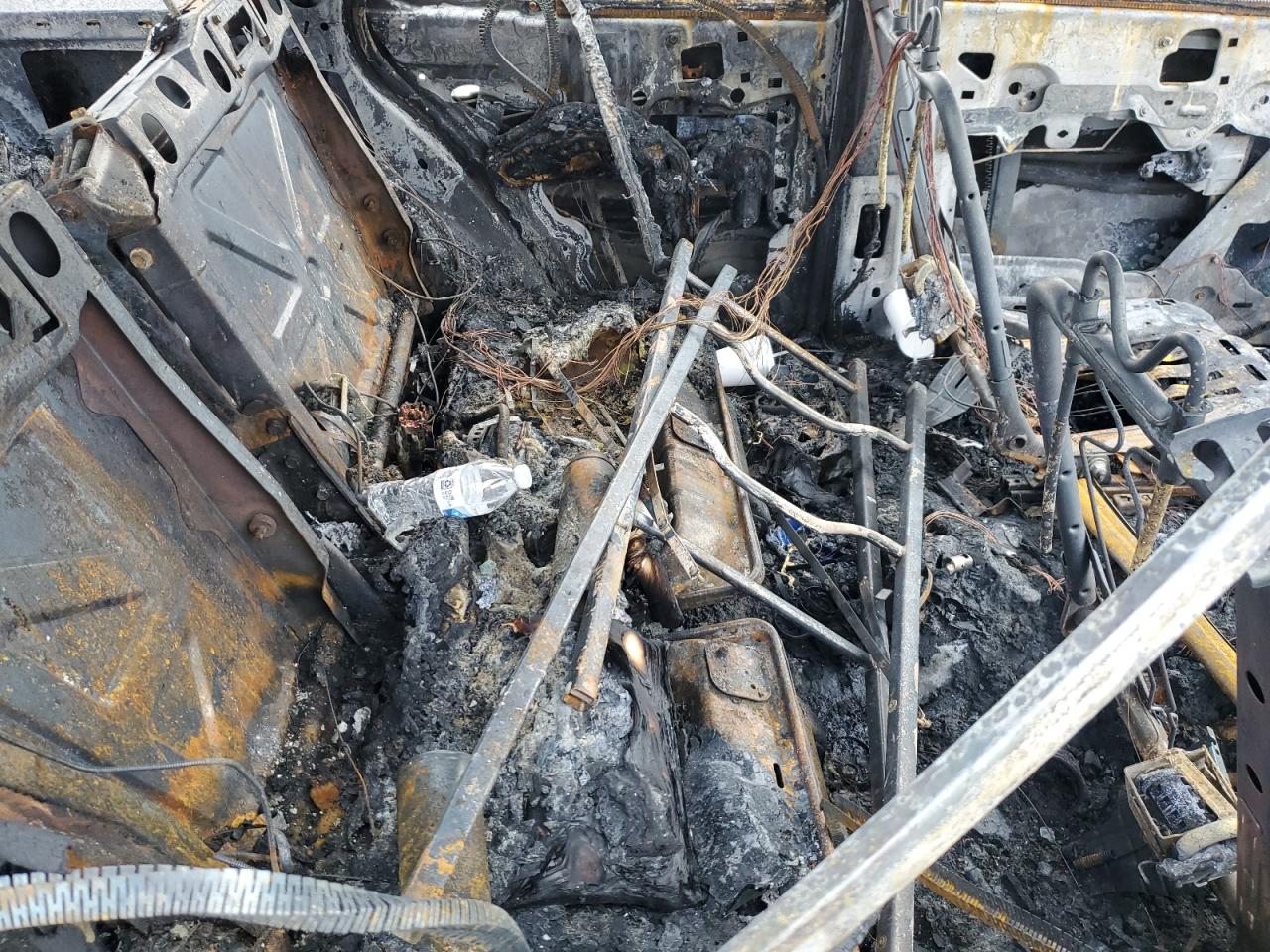 2005 Chevrolet TrailBlazer VIN 1GNDT13SX52135663 Copart auction photo, burn damage thumbnail 10