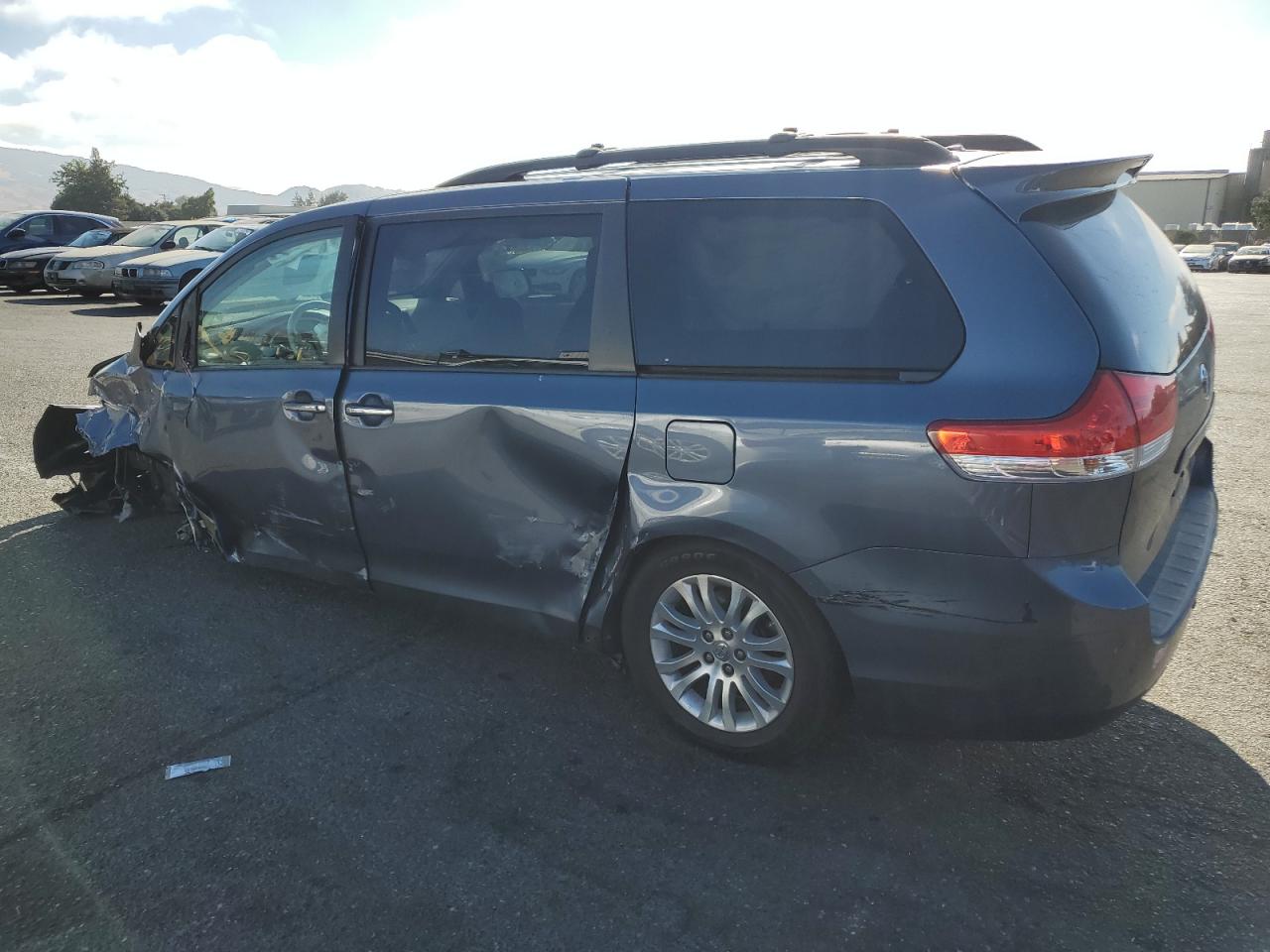 2014 Toyota Sienna VIN 5TDYK3DC5ES499322 Copart auction photo, all over damage thumbnail 2