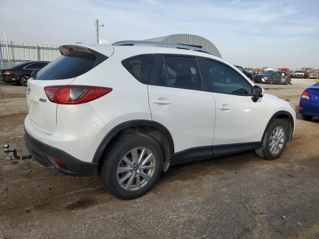 2015 Mazda CX-5 VIN JM3KE2CY2F0456136 Copart auction photo, front end / side damage thumbnail 3