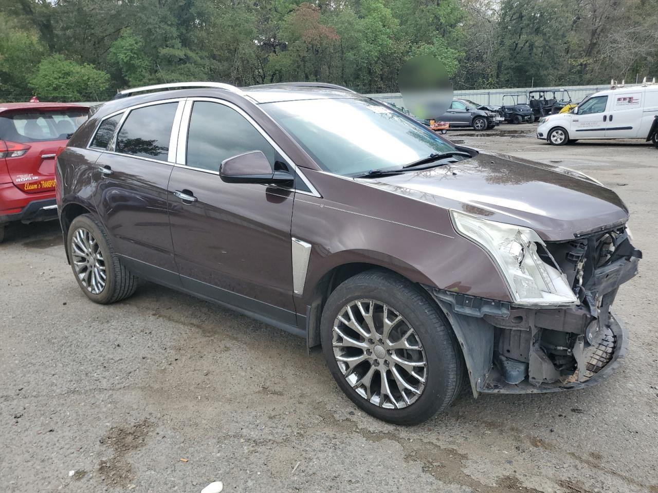 2015 Cadillac SRX VIN 3GYFNCE33FS571798 Copart auction photo, front end / minor dent/scratches damage thumbnail 4