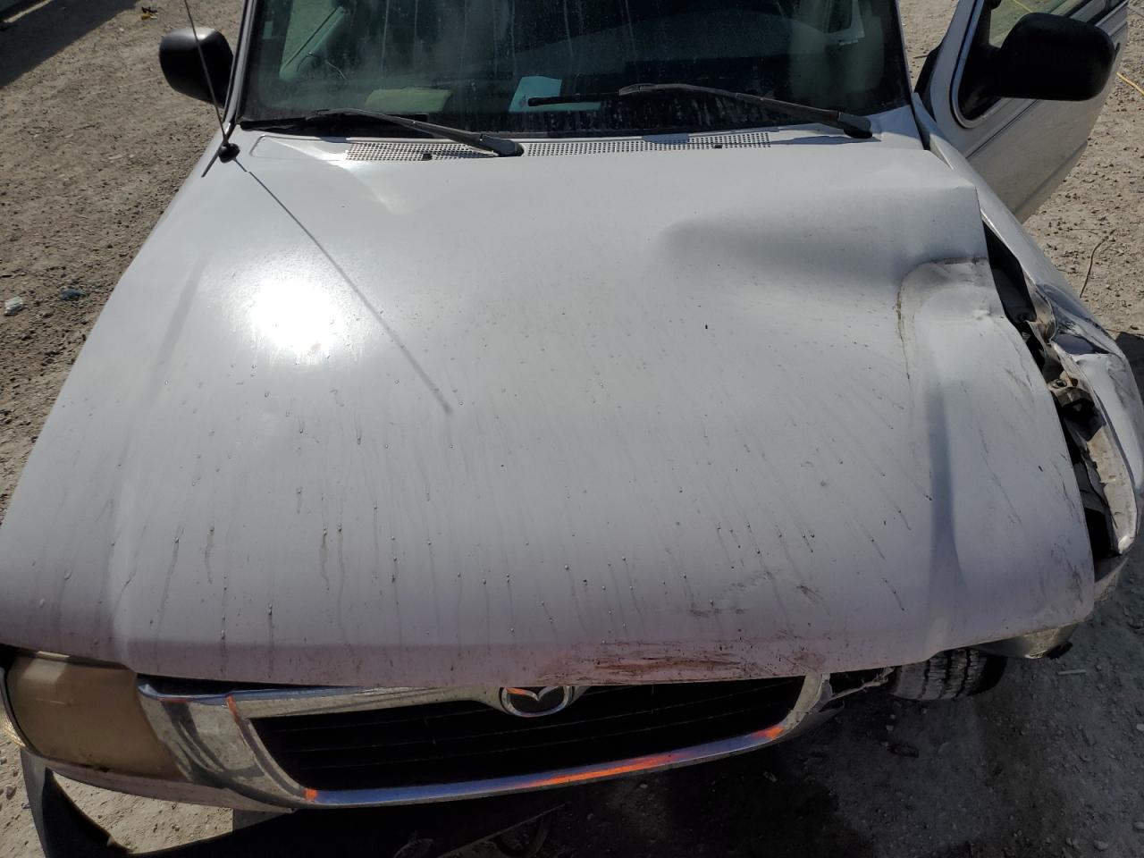 2000 Mazda B-series VIN 4F4YR16VXYTM31299 Copart auction photo, front end / side damage thumbnail 11