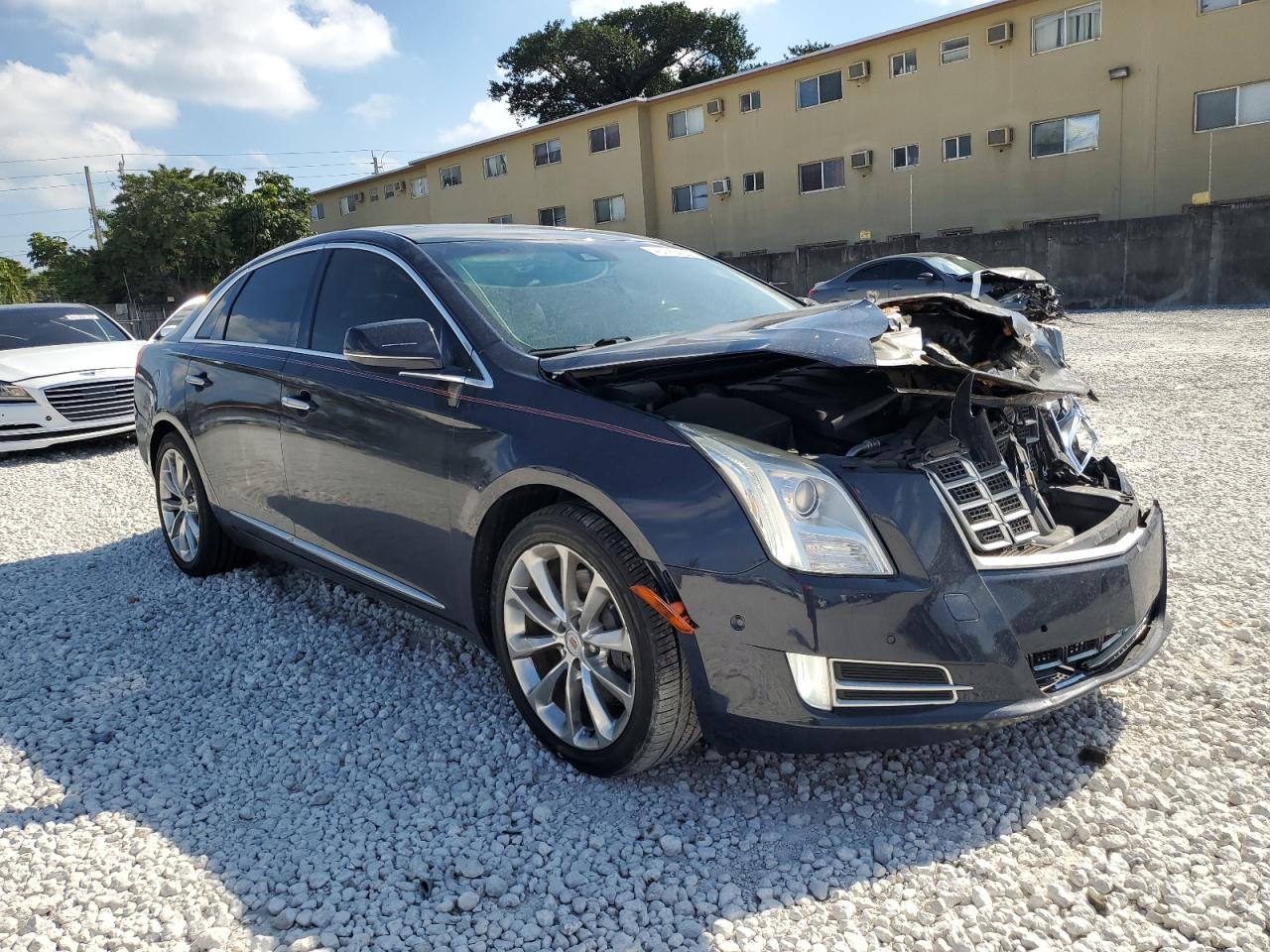 2014 Cadillac XTS VIN 2G61P5S32E9202312 Copart auction photo, front end / minor dent/scratches damage thumbnail 4
