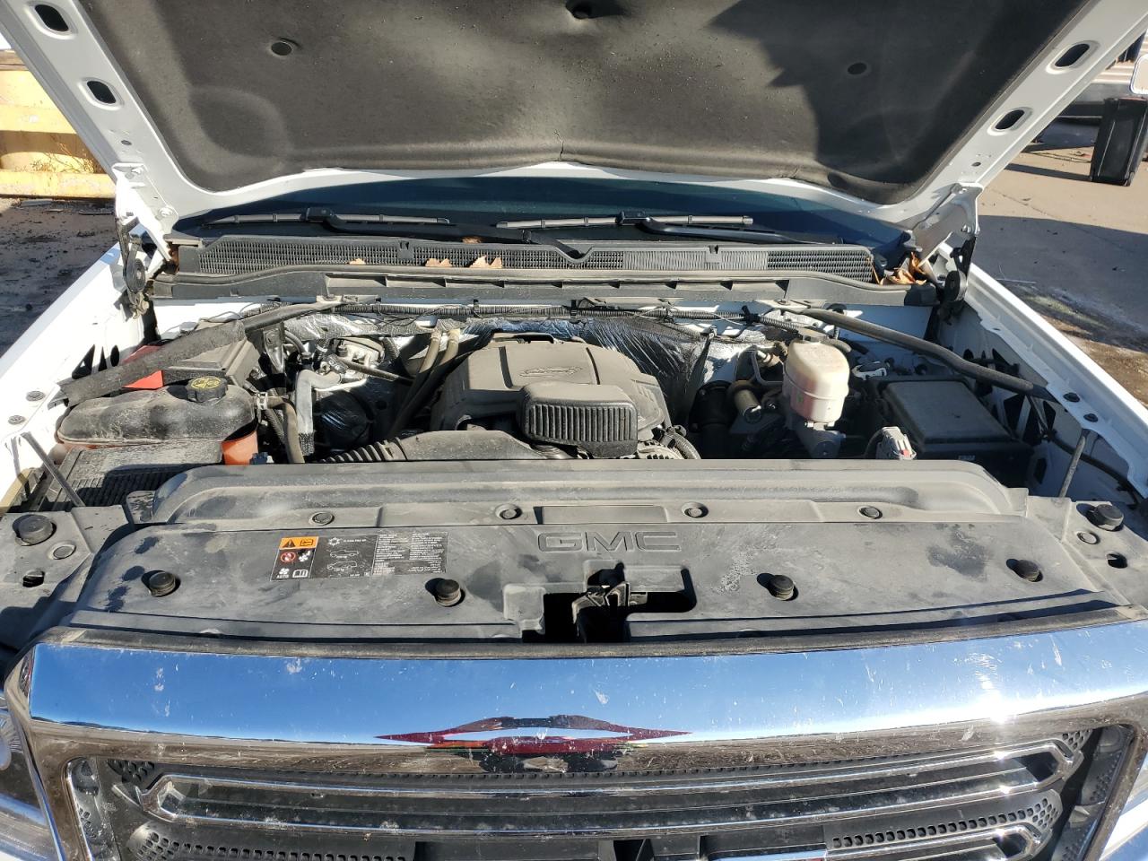 2015 GMC Sierra VIN 1GT12ZEG3FF110359 Copart auction photo, burn / rear end damage thumbnail 11