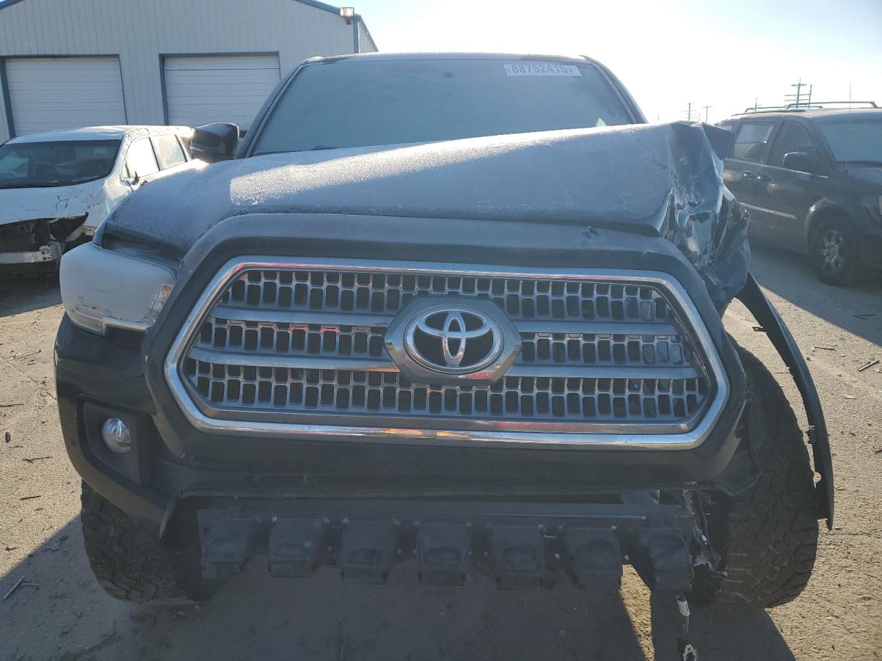 2016 Toyota Tacoma VIN 5TFCZ5ANXGX012670 Copart auction photo, front end / undercarriage damage thumbnail 5