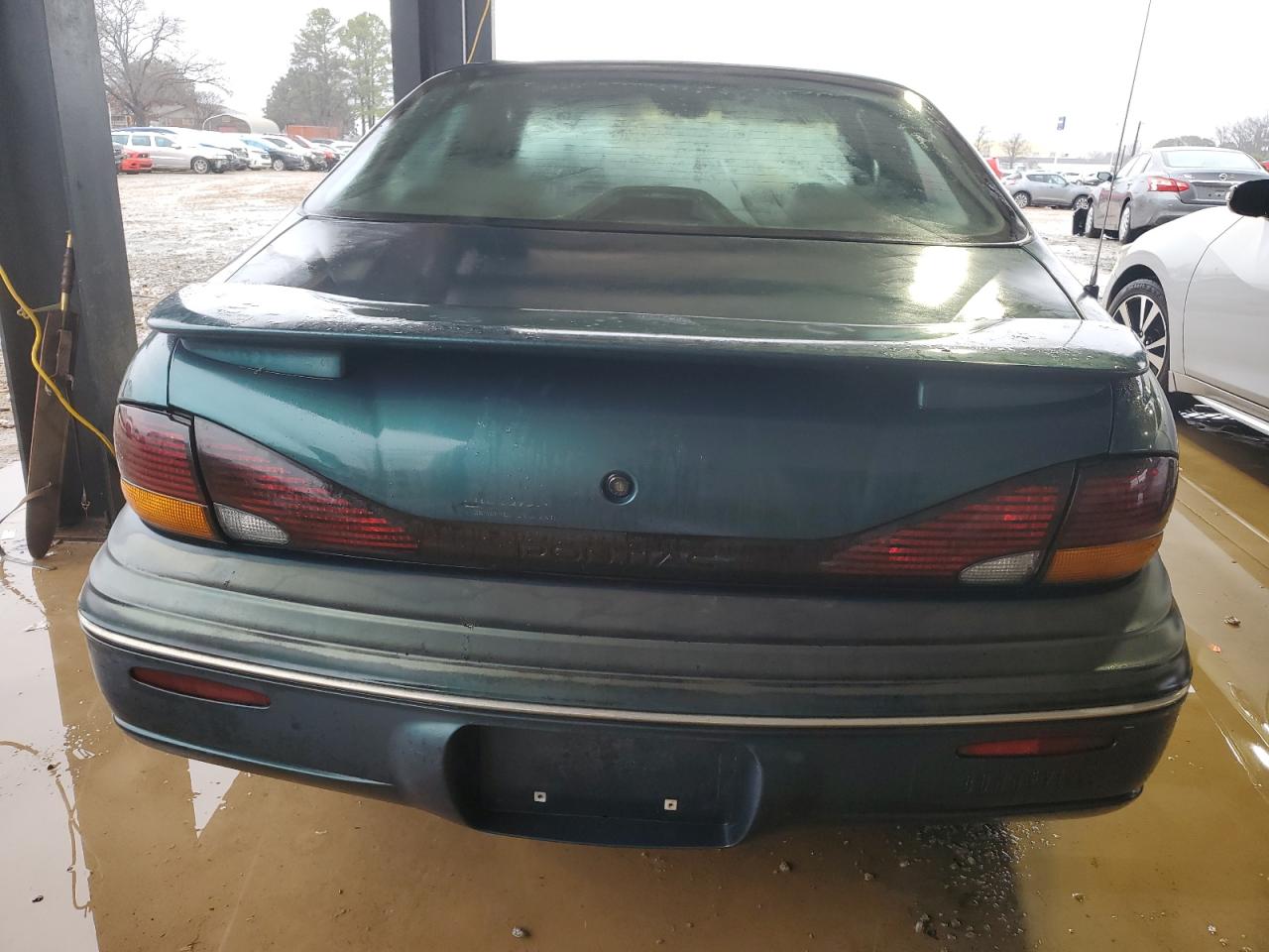 1997 Pontiac Bonneville VIN 1G2HX52K4VH250252 Copart auction photo, front end damage thumbnail 6