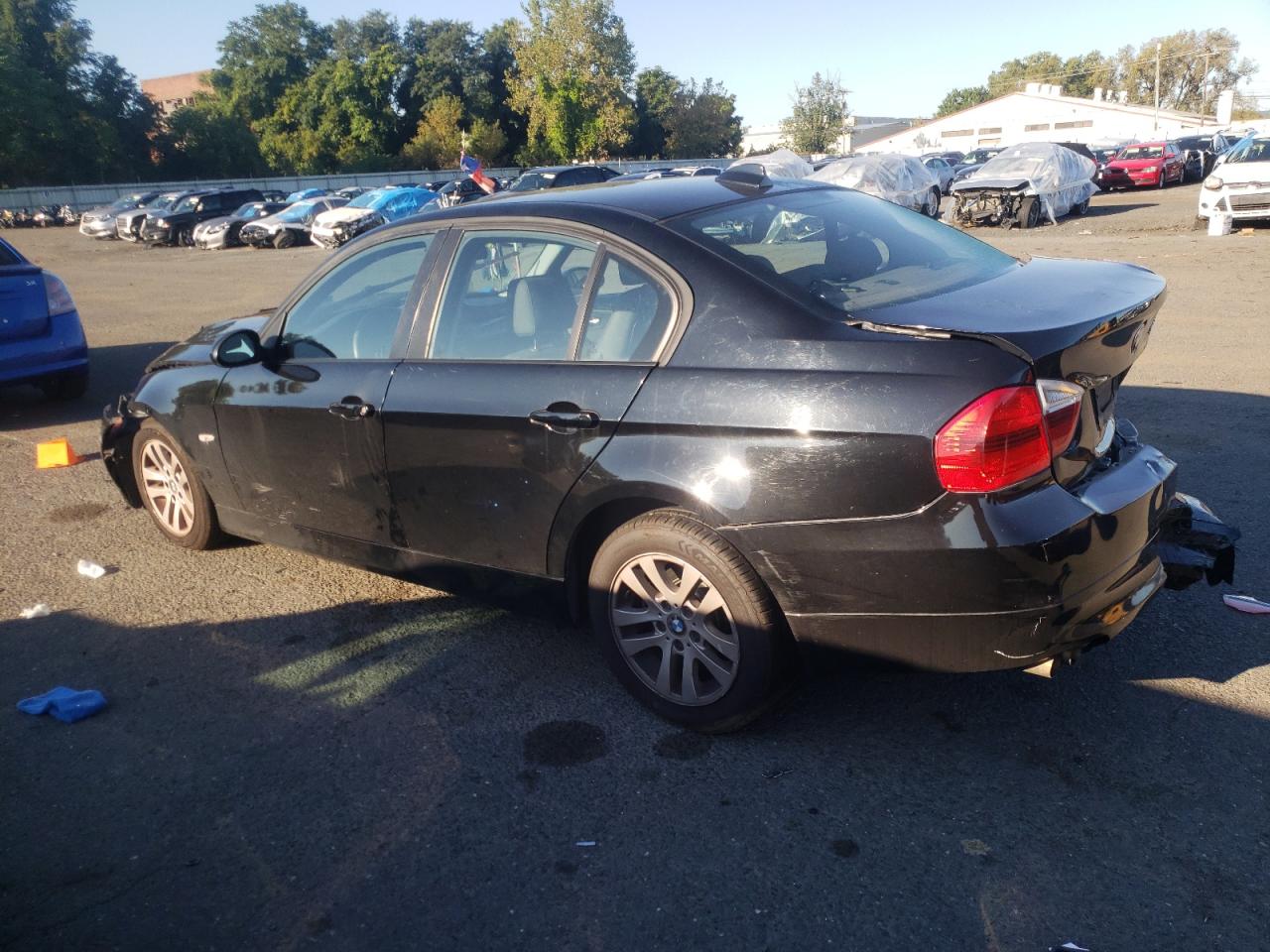 2007 BMW 3er VIN WBAVC73507KP33822 Copart auction photo, front end / rear end damage thumbnail 2