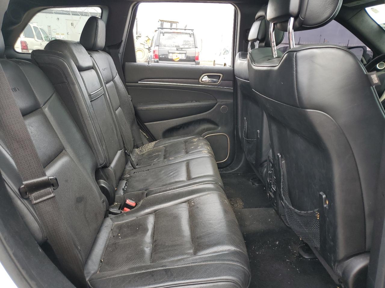 2014 Jeep Grand Cherokee VIN 1C4RJFJT1EC531603 Copart auction photo, vandalism / front end damage thumbnail 11