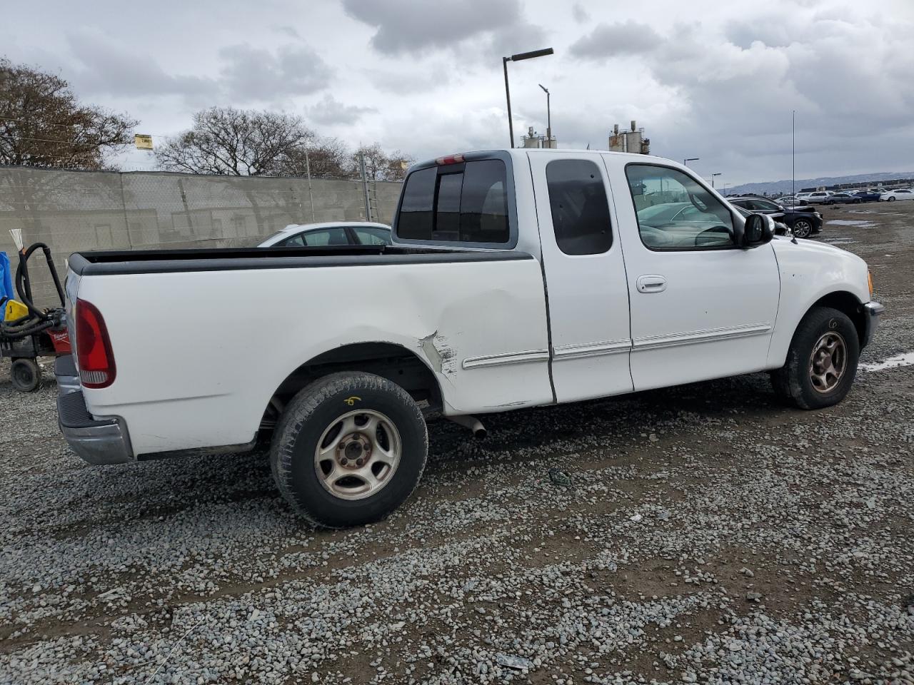 1997 Ford F-150 VIN 1FTDX1720VKC47038 Copart auction photo, side damage thumbnail 3