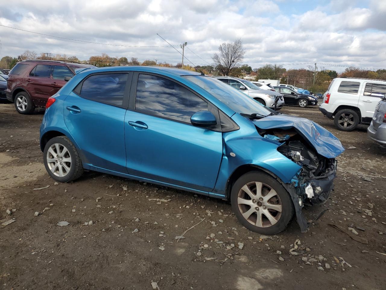 2012 Mazda 2 VIN JM1DE1LZ6C0151299 Copart auction photo, front end / minor dent/scratches damage thumbnail 4
