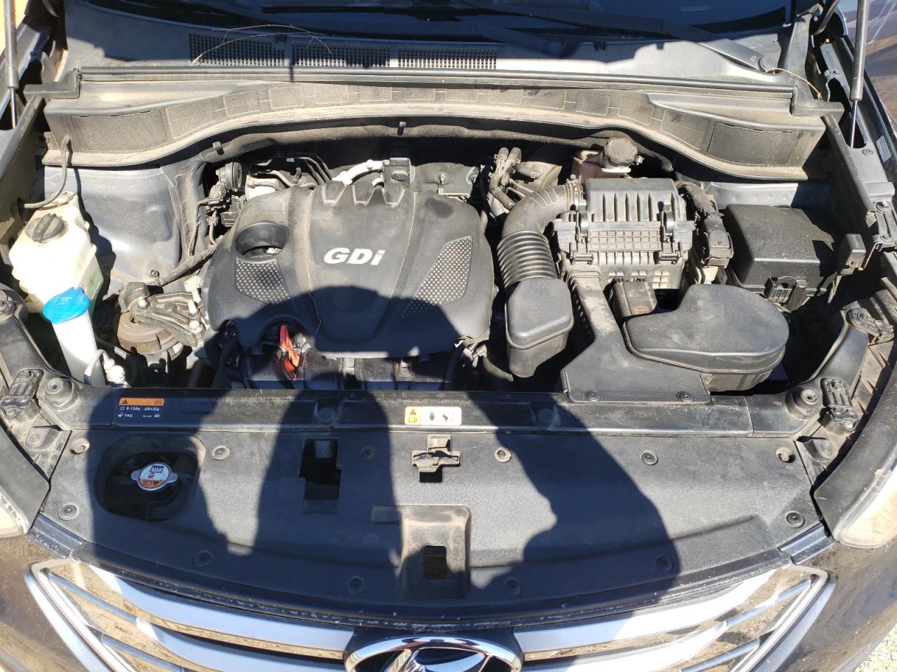 2015 Hyundai Santa Fe VIN 5XYZTDLB1FG290688 Copart auction photo, front end / side damage thumbnail 12