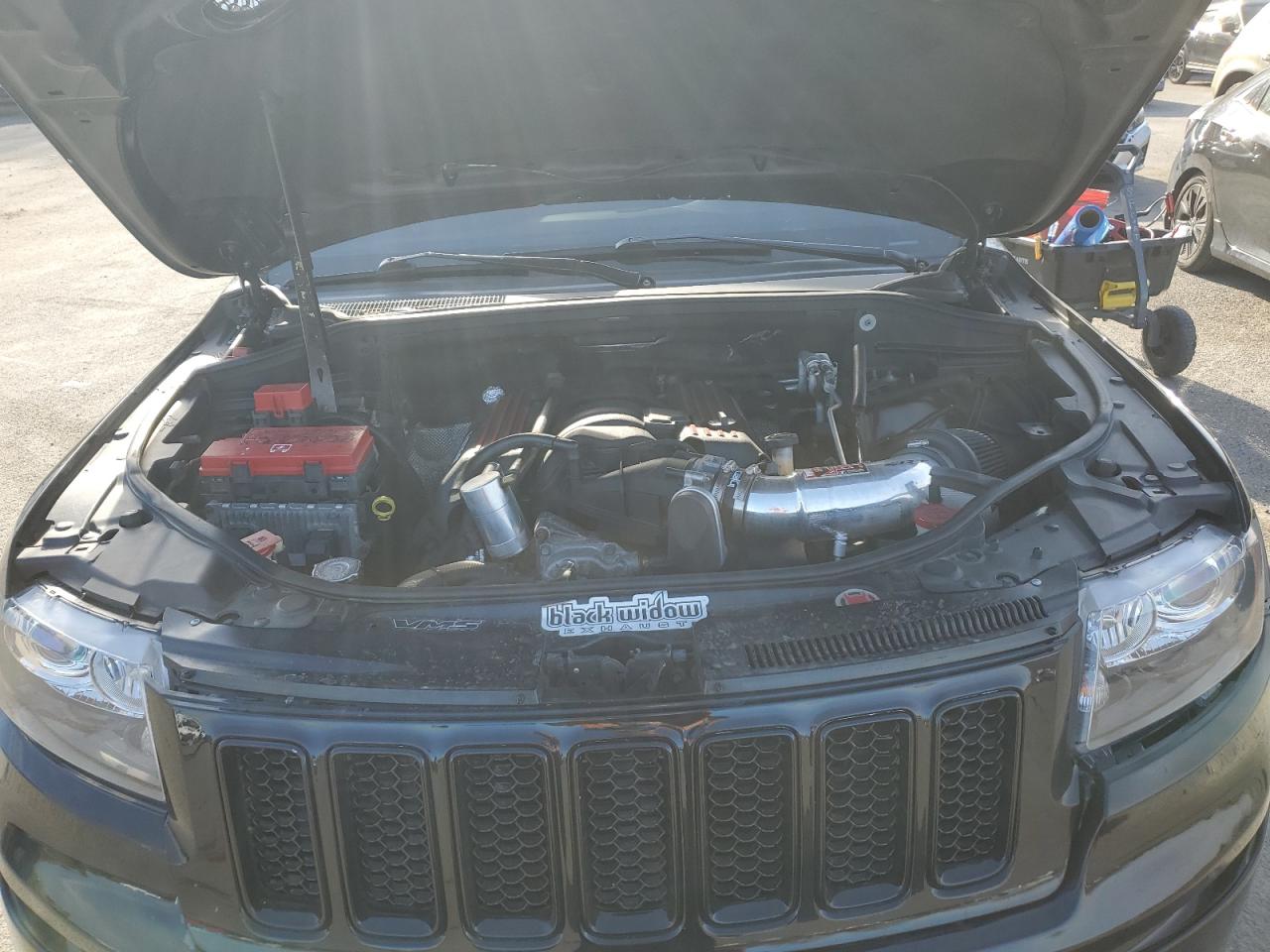 2012 Jeep Grand Cherokee VIN 1C4RJFDJ3CC152044 Copart auction photo, minor dent/scratches damage thumbnail 12