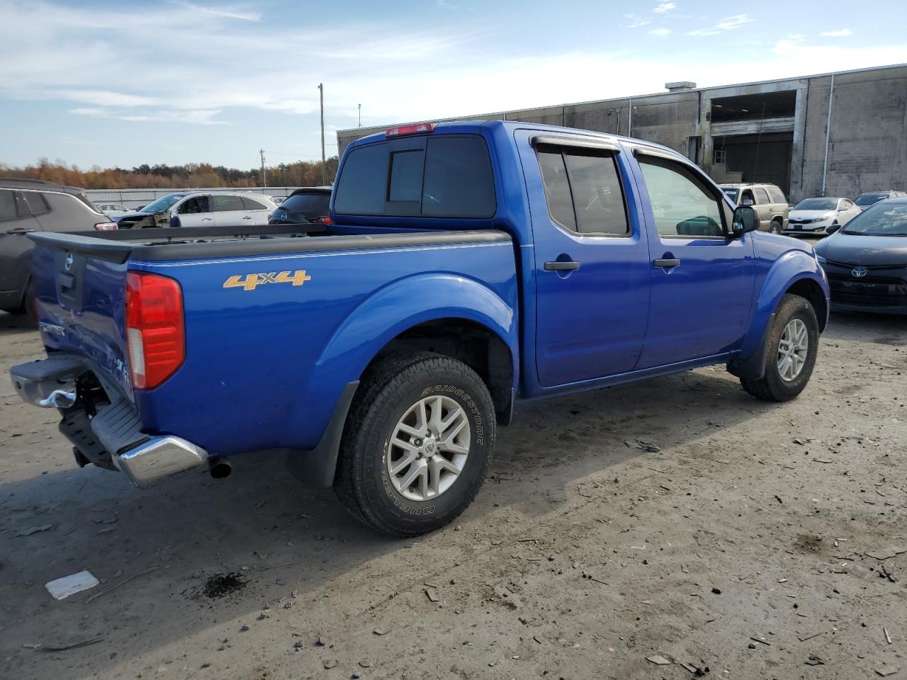 2015 Nissan Navara (Frontier) VIN 1N6AD0EV1FN764817 Copart auction photo, rear end / minor dent/scratches damage thumbnail 3