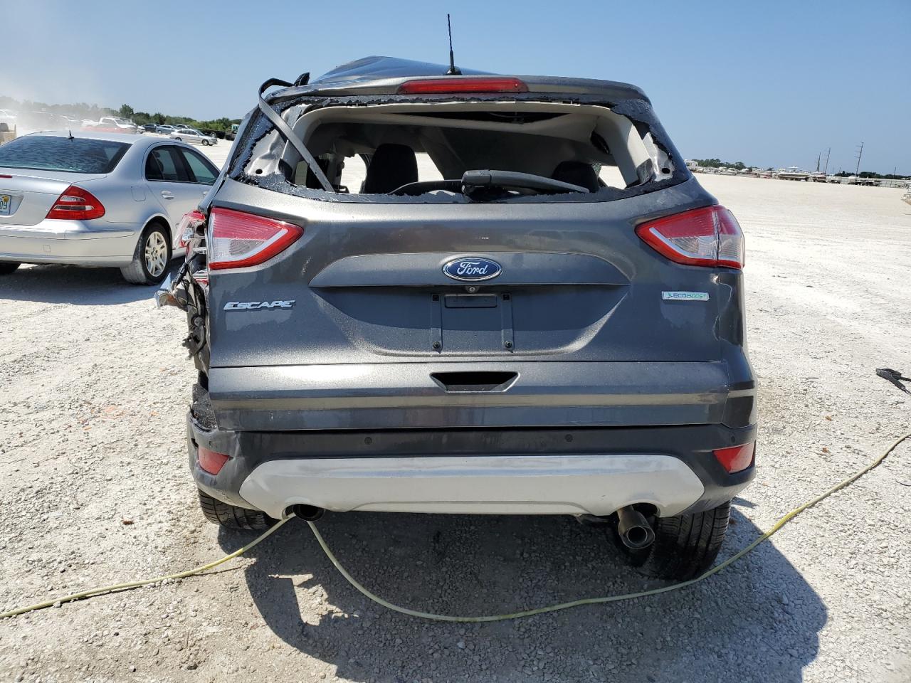 2015 Ford Escape VIN 1FMCU0GX8FUC32606 Copart auction photo, rollover damage thumbnail 6
