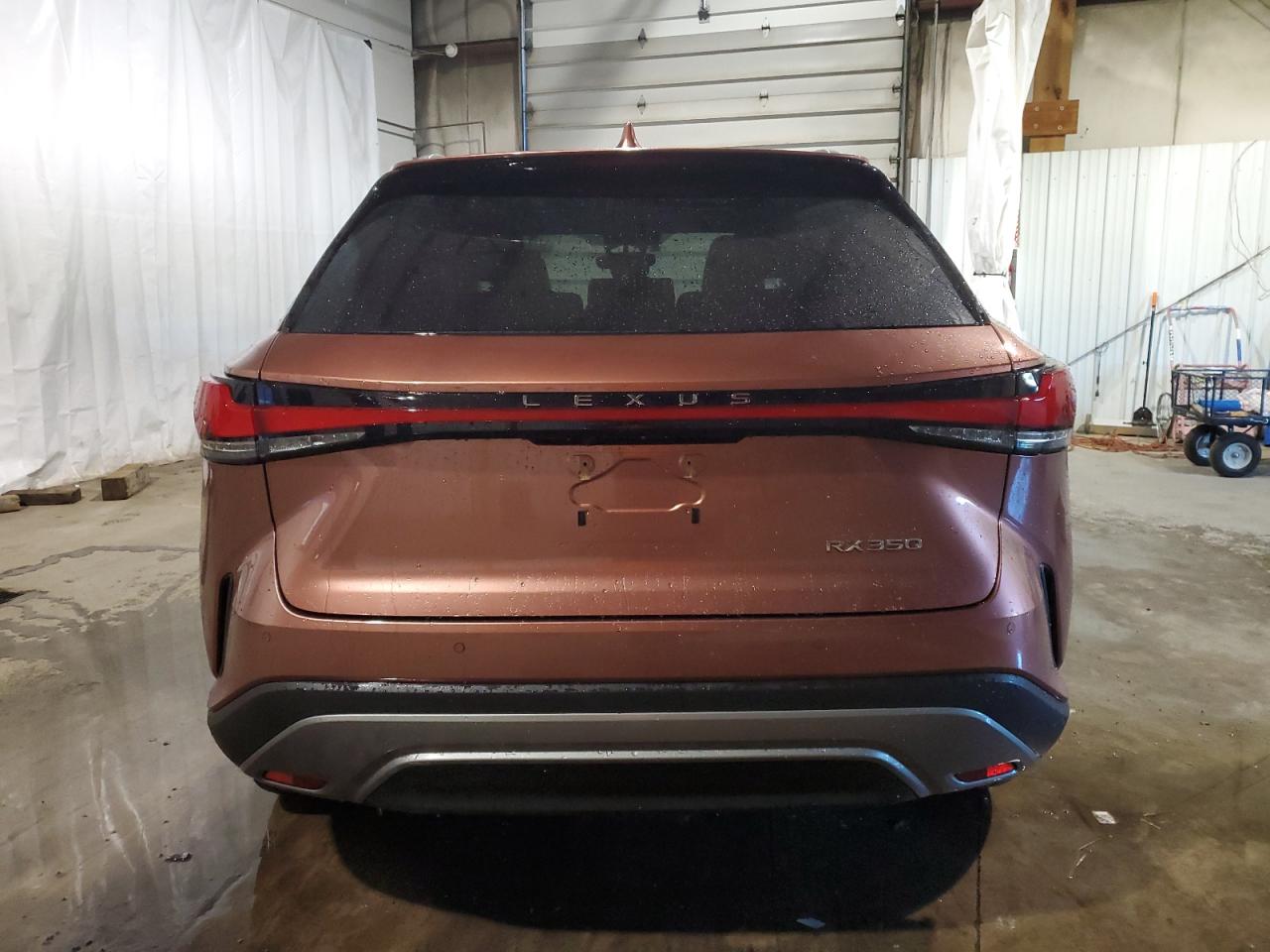2023 Lexus RX VIN JTJCHMAA0P2005747 Copart auction photo, side damage thumbnail 6