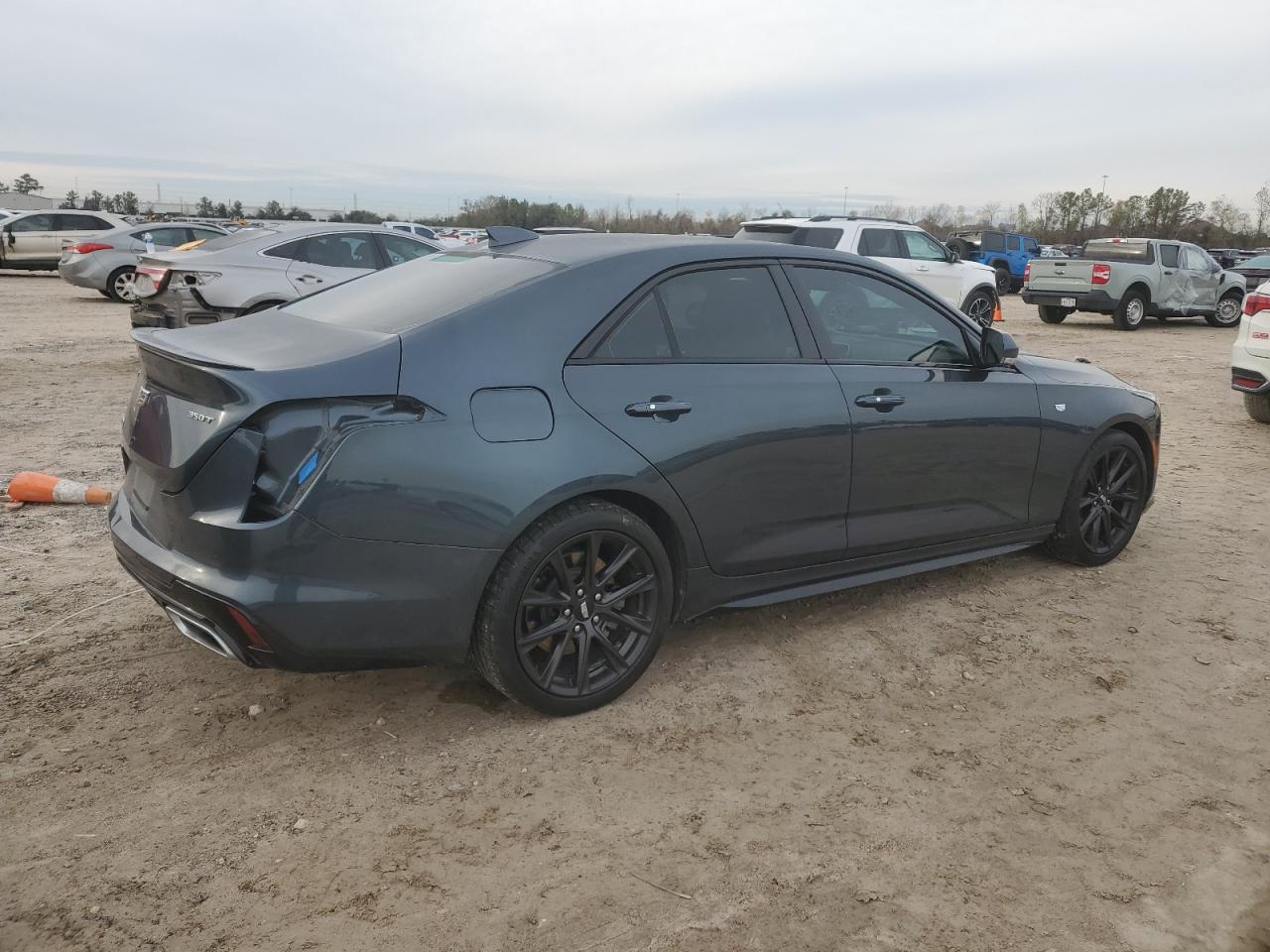 2021 Cadillac CT4 VIN 1G6DC5RK7M0111969 Copart auction photo, side / minor dent/scratches damage thumbnail 3
