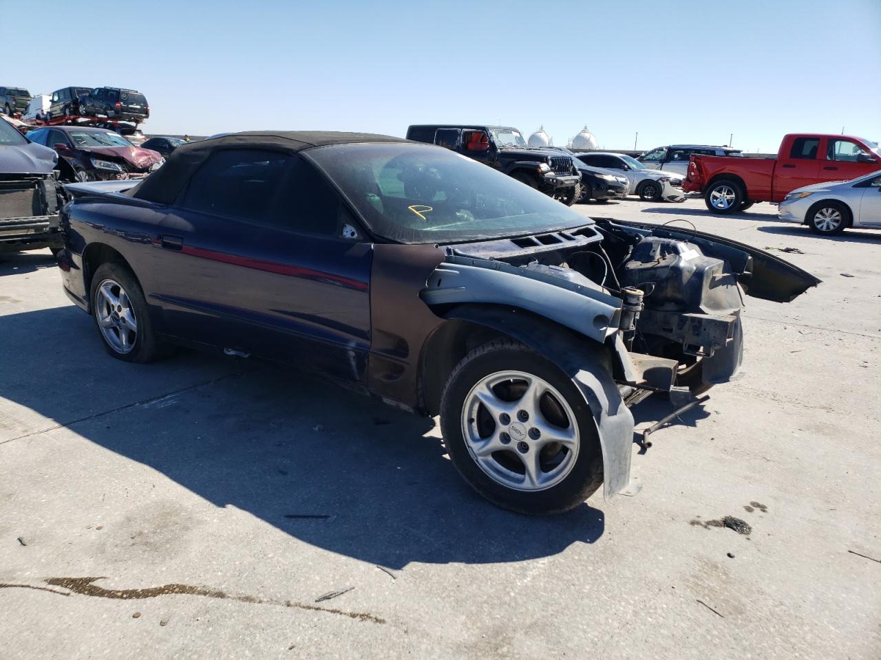 1999 Pontiac Firebird VIN 2G2FV32G4X2229091 Copart auction photo, stripped / replaced vin damage thumbnail 4