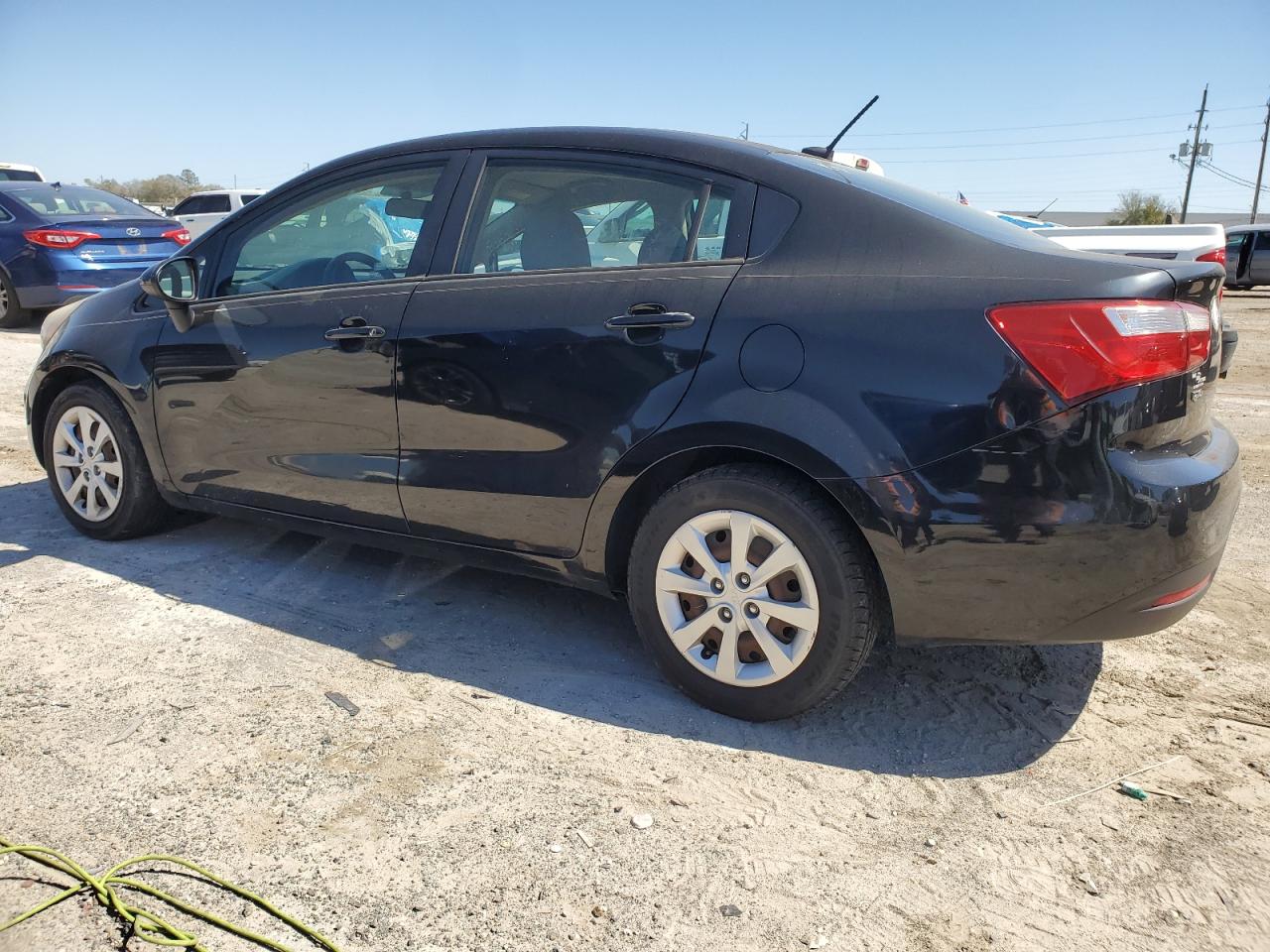 2014 KIA Rio VIN KNADM4A35E6351672 Copart auction photo, minor dent/scratches damage thumbnail 2