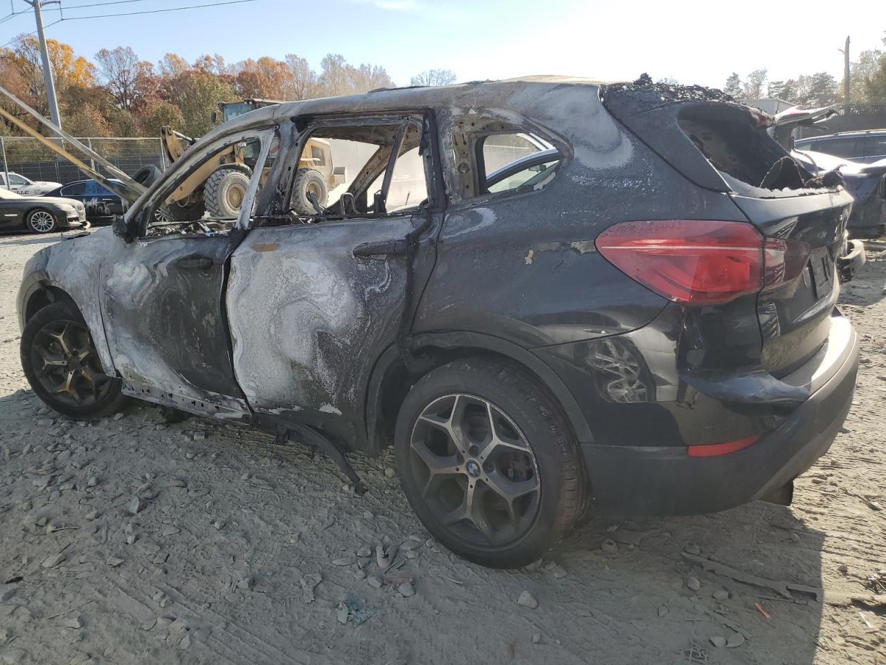 2017 BMW X1 VIN WBXHT3C37H5F79445 Copart auction photo, burn damage thumbnail 2
