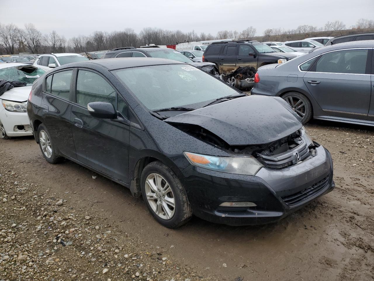 2010 Honda Insight VIN JHMZE2H77AS000829 Copart auction photo, front end / side damage thumbnail 4