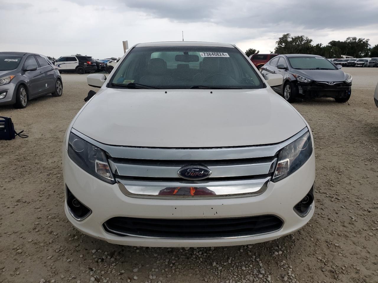 2010 Ford Fusion VIN 3FADP0L33AR239116 Copart auction photo, water/flood damage thumbnail 5