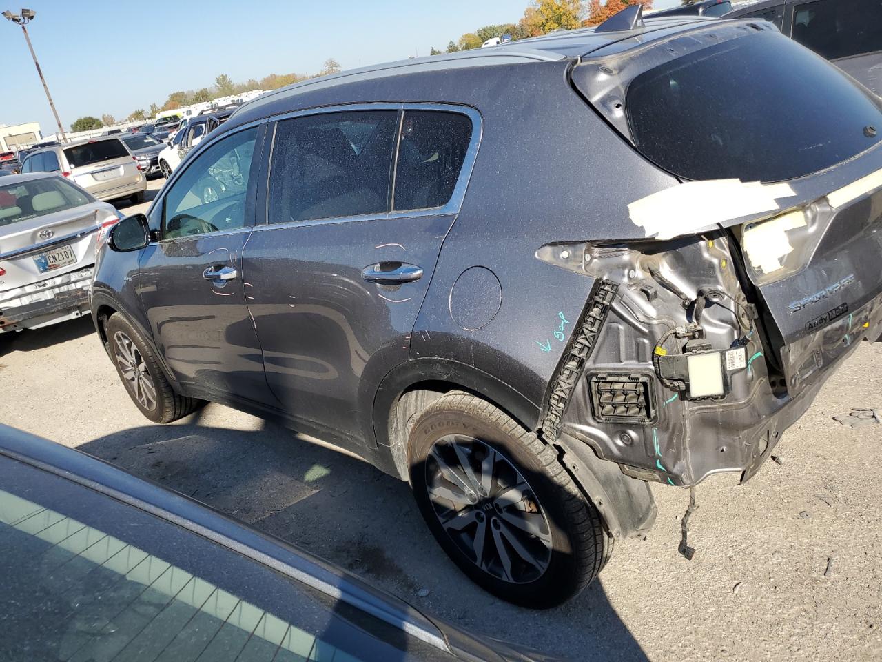 2018 KIA Sportage VIN KNDPNCAC5J7322037 Copart auction photo, rear end / minor dent/scratches damage thumbnail 2