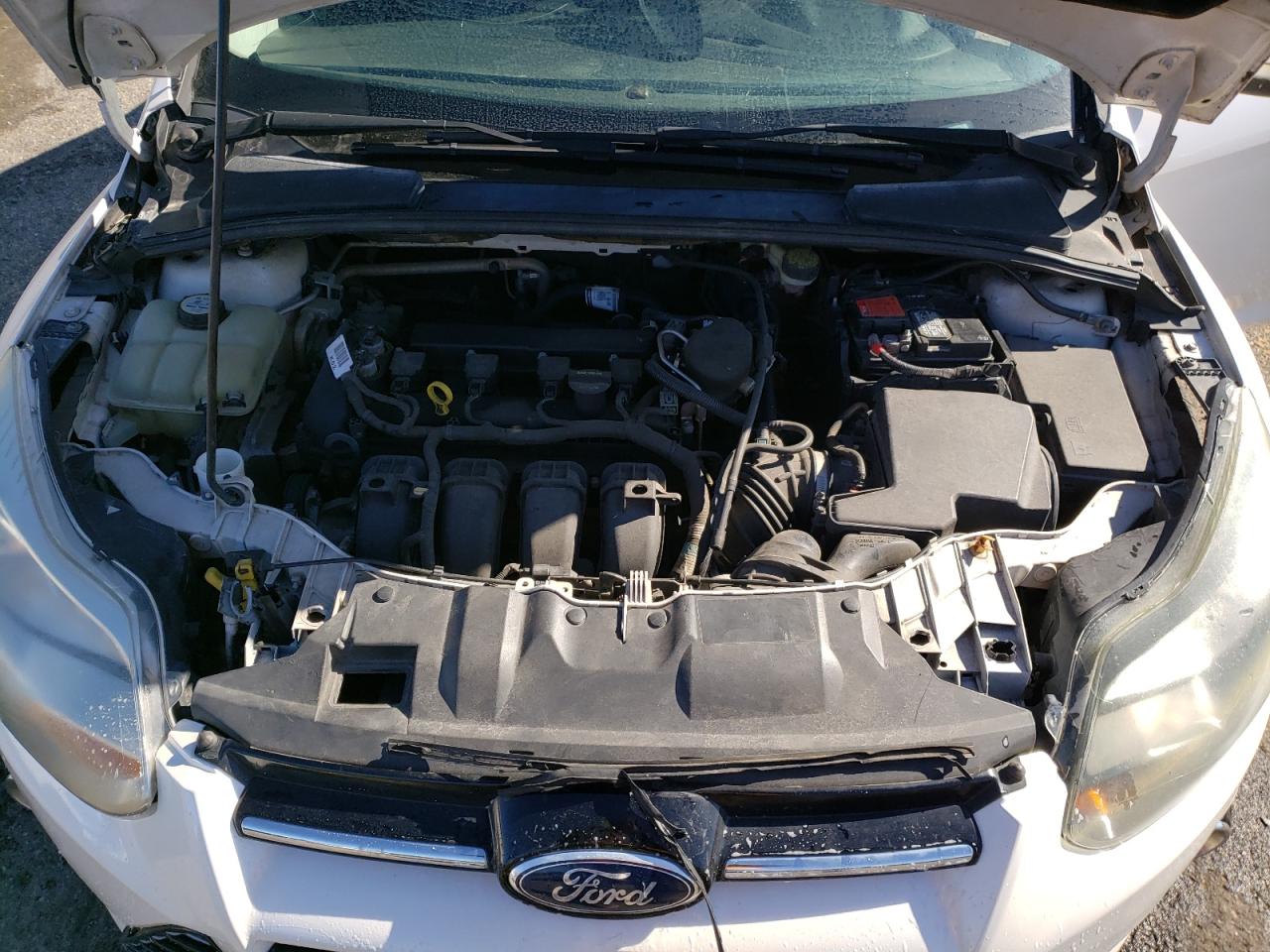 2012 Ford Focus VIN 1FAHP3J2XCL433401 Copart auction photo, front end damage thumbnail 11