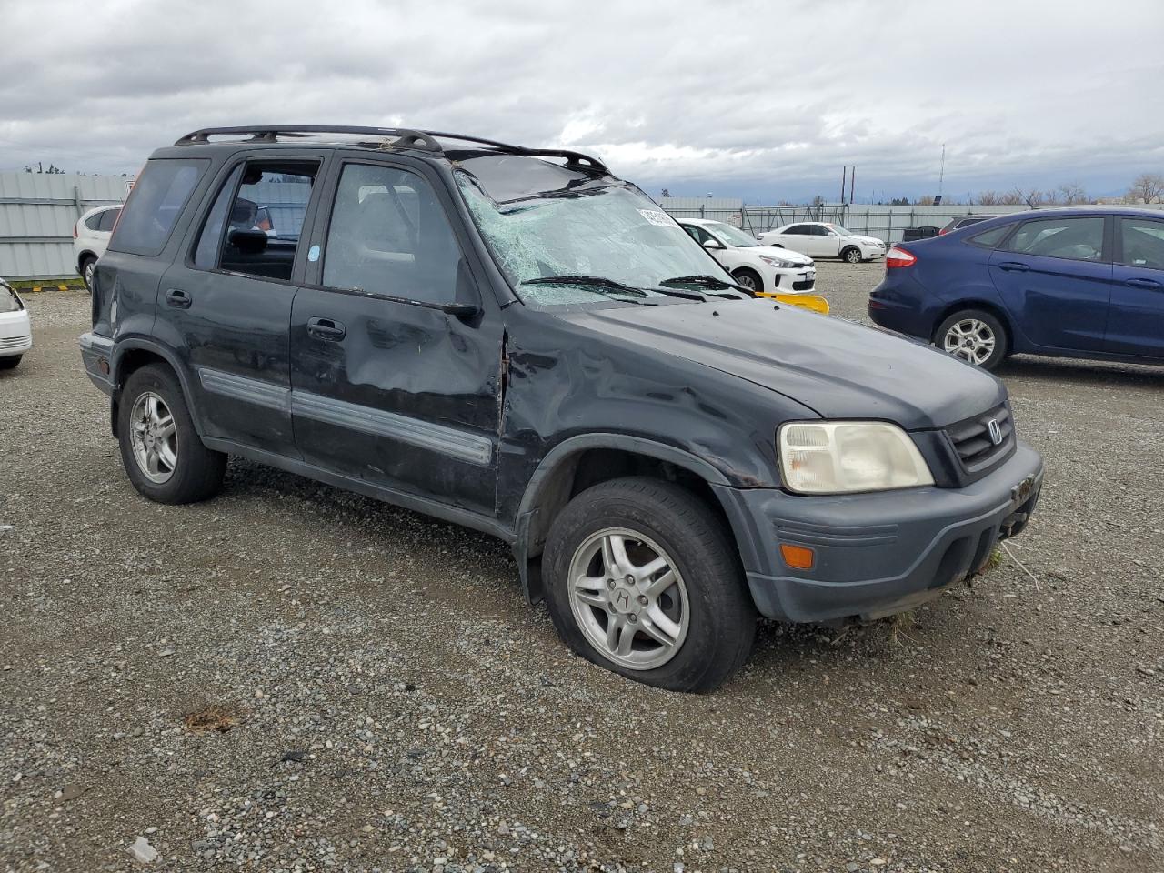 2000 Honda CR-V VIN JHLRD1861YC026016 Copart auction photo, all over damage thumbnail 4