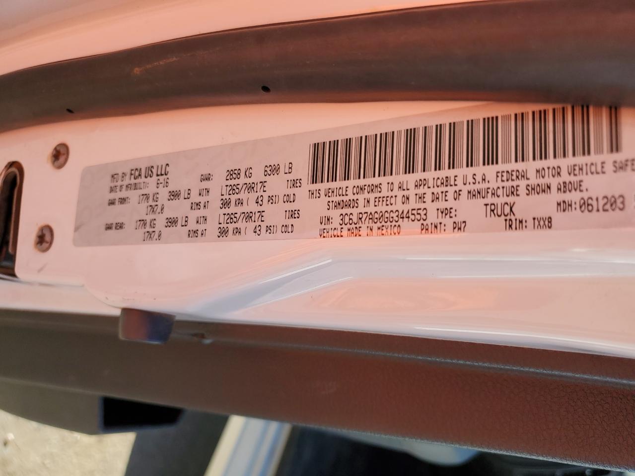 2016 RAM 1500 VIN 3C6JR7AG0GG344553 Copart auction photo, minor dent/scratches damage thumbnail 12