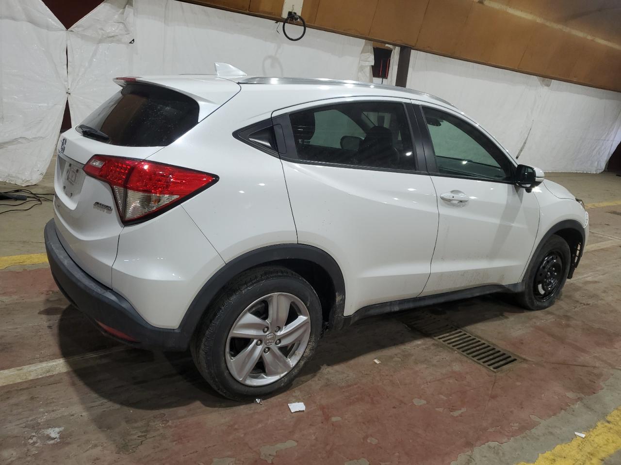 2019 Honda HR-V VIN 3CZRU6H54KM738893 Copart auction photo, front end / minor dent/scratches damage thumbnail 3