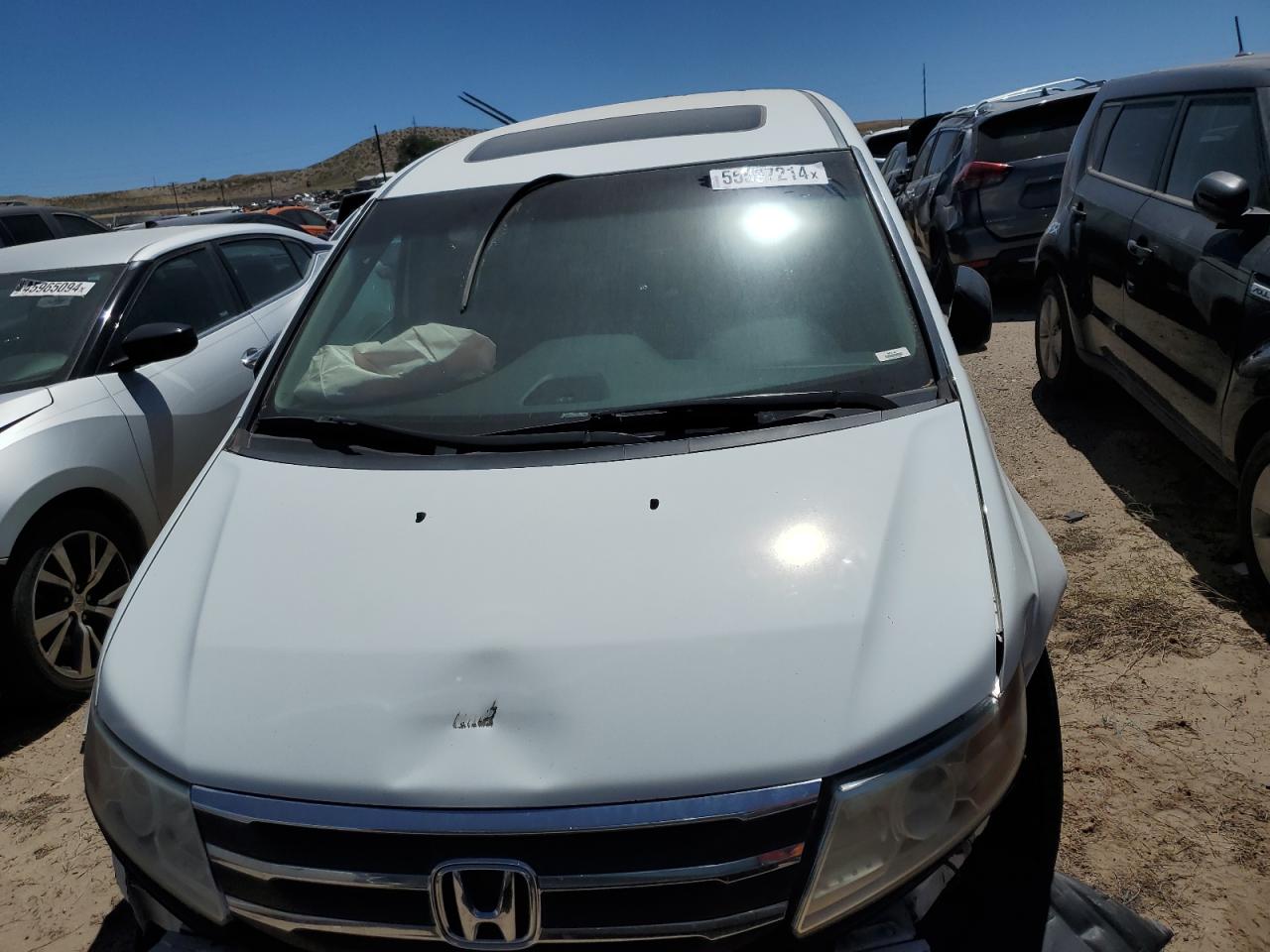 2012 Honda Odyssey VIN 5FNRL5H62CB077009 Copart auction photo, front end / side damage thumbnail 5