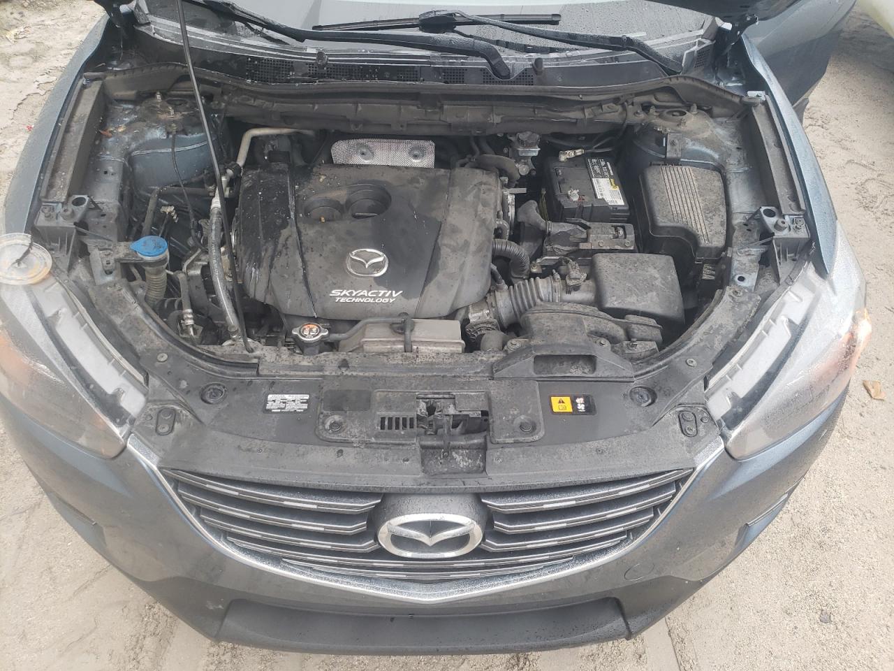 2016 Mazda CX-5 VIN JM3KE2CY7G0728052 Copart auction photo, all over damage thumbnail 12