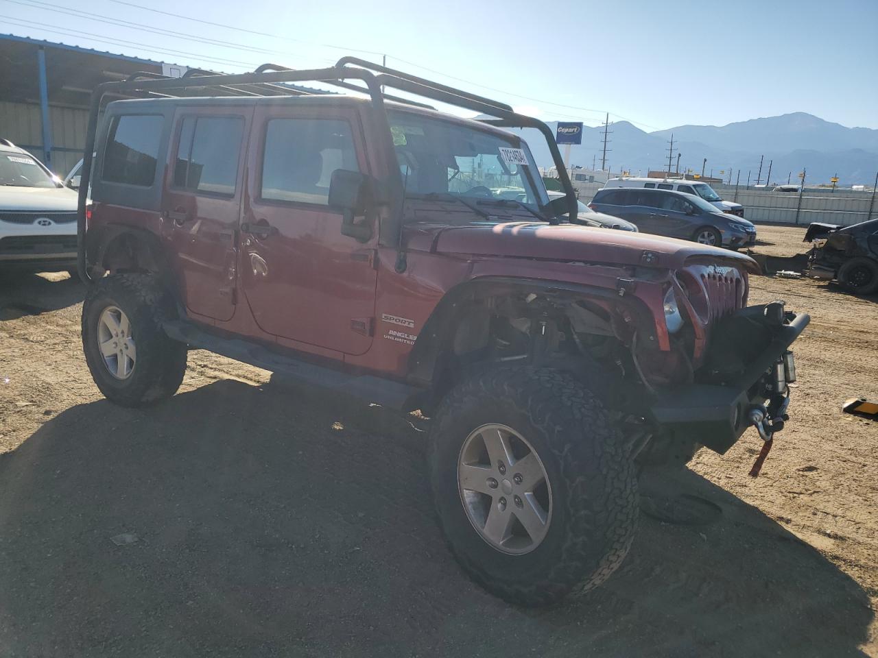 2011 Jeep Wrangler VIN 1J4BA3H18BL525906 Copart auction photo, front end / side damage thumbnail 4