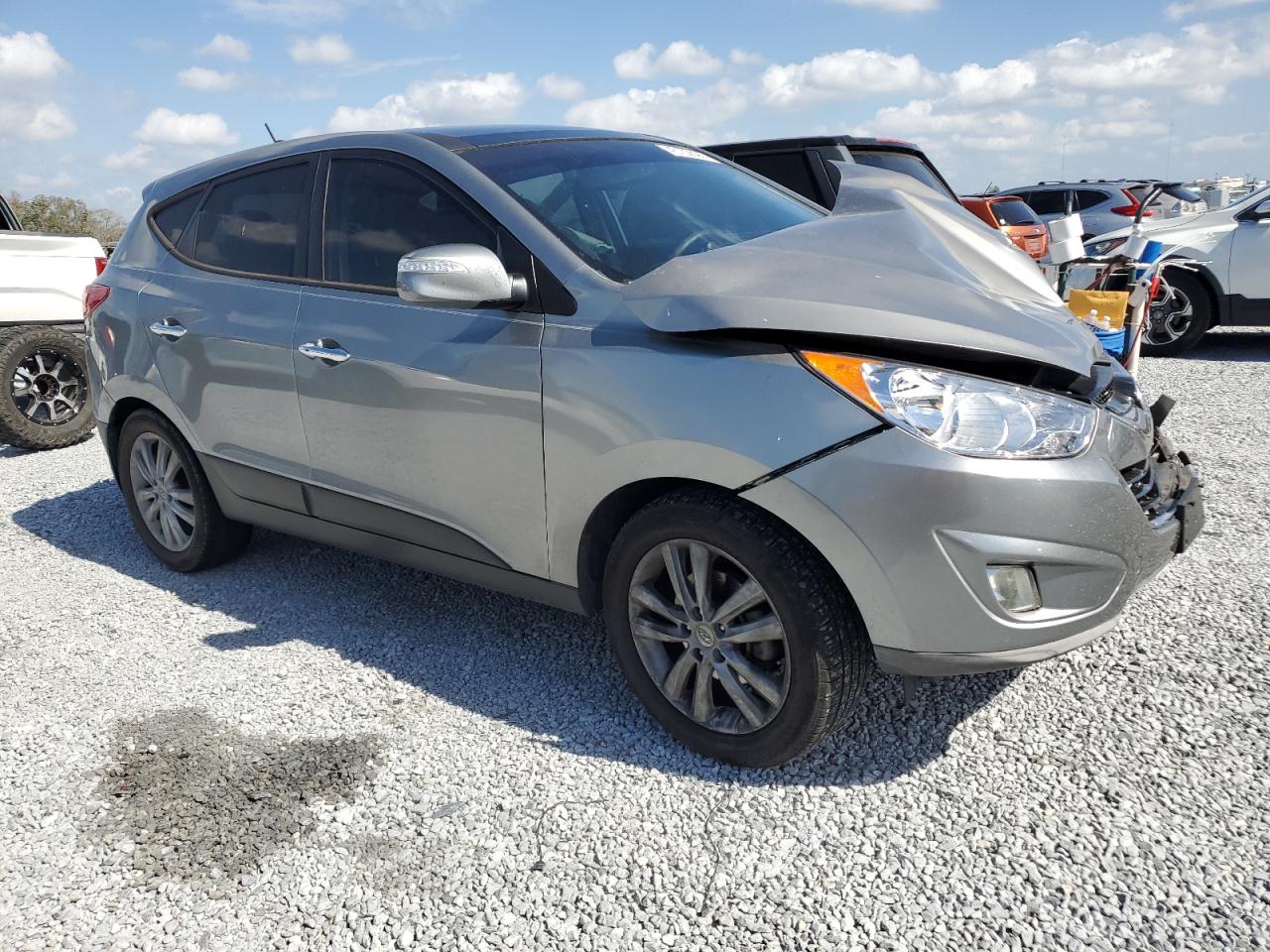 2013 Hyundai Tucson VIN KM8JU3AC4DU727378 Copart auction photo, front end damage thumbnail 4