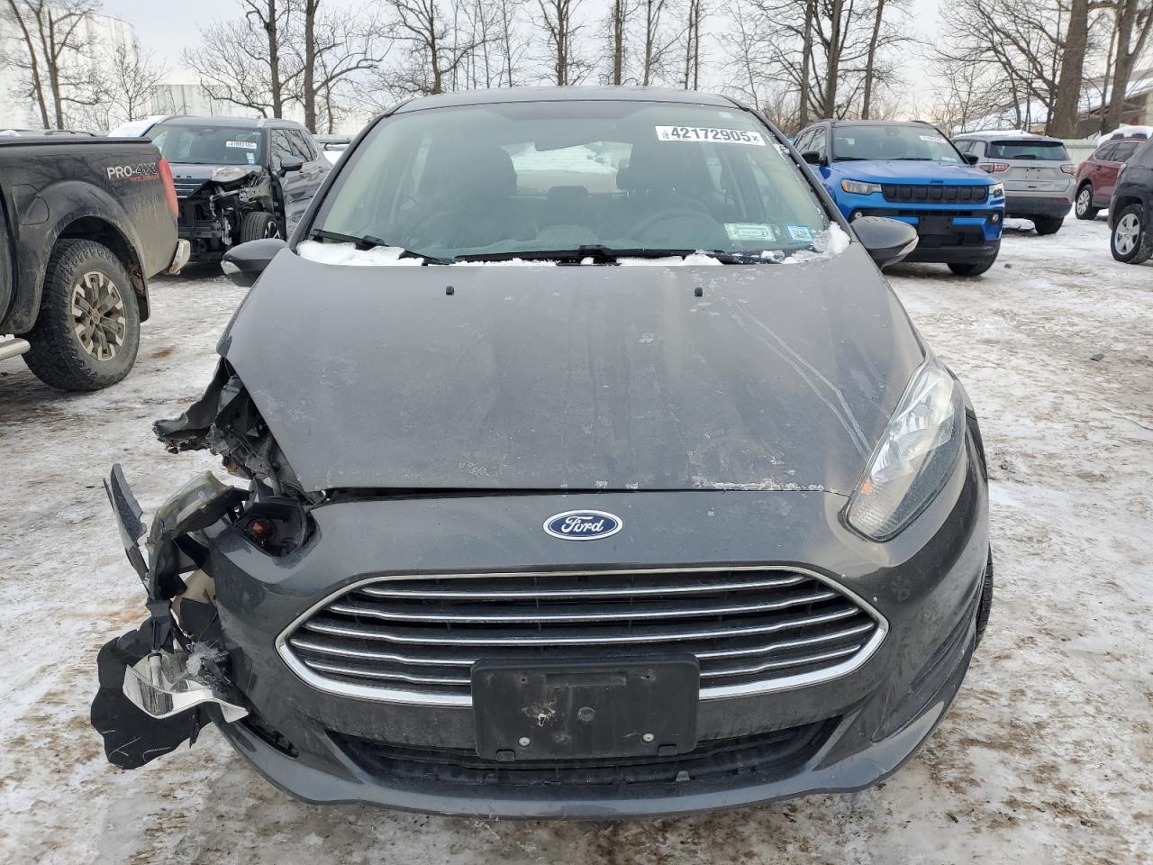2018 Ford Fiesta VIN 3FADP4EJ6JM140001 Copart auction photo, front end / all over damage thumbnail 5